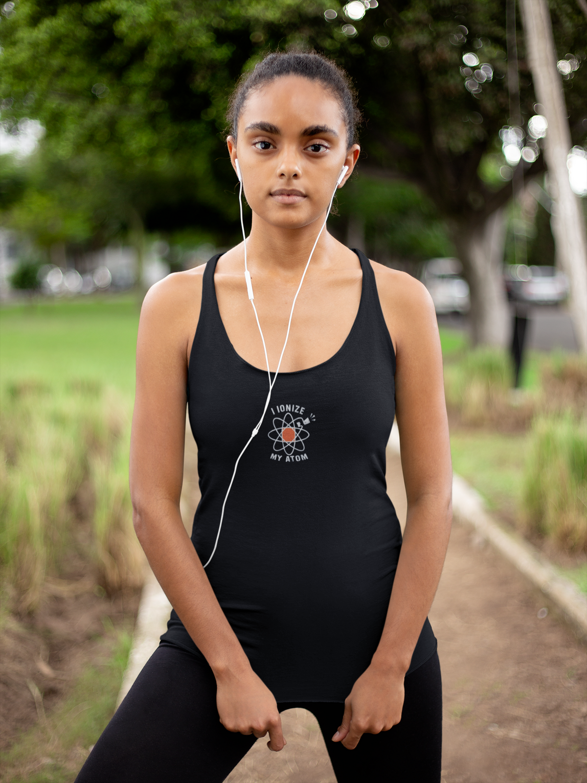 'Ionize Off My Atom Tank' in black, woman in a park, Tank Top mockup, Geekpsters