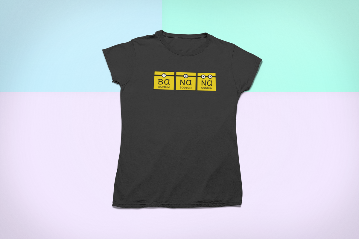 'Banana' periodic table T-shirt in black, flat lay on a pastel backdrop, funny science gift shirt