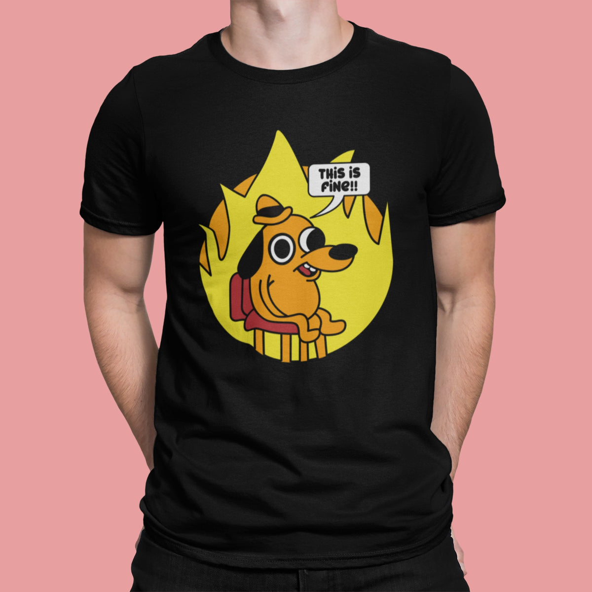 This Is Fine tee in black, man on a pink backdrop, cartoon dog in flames meme gift