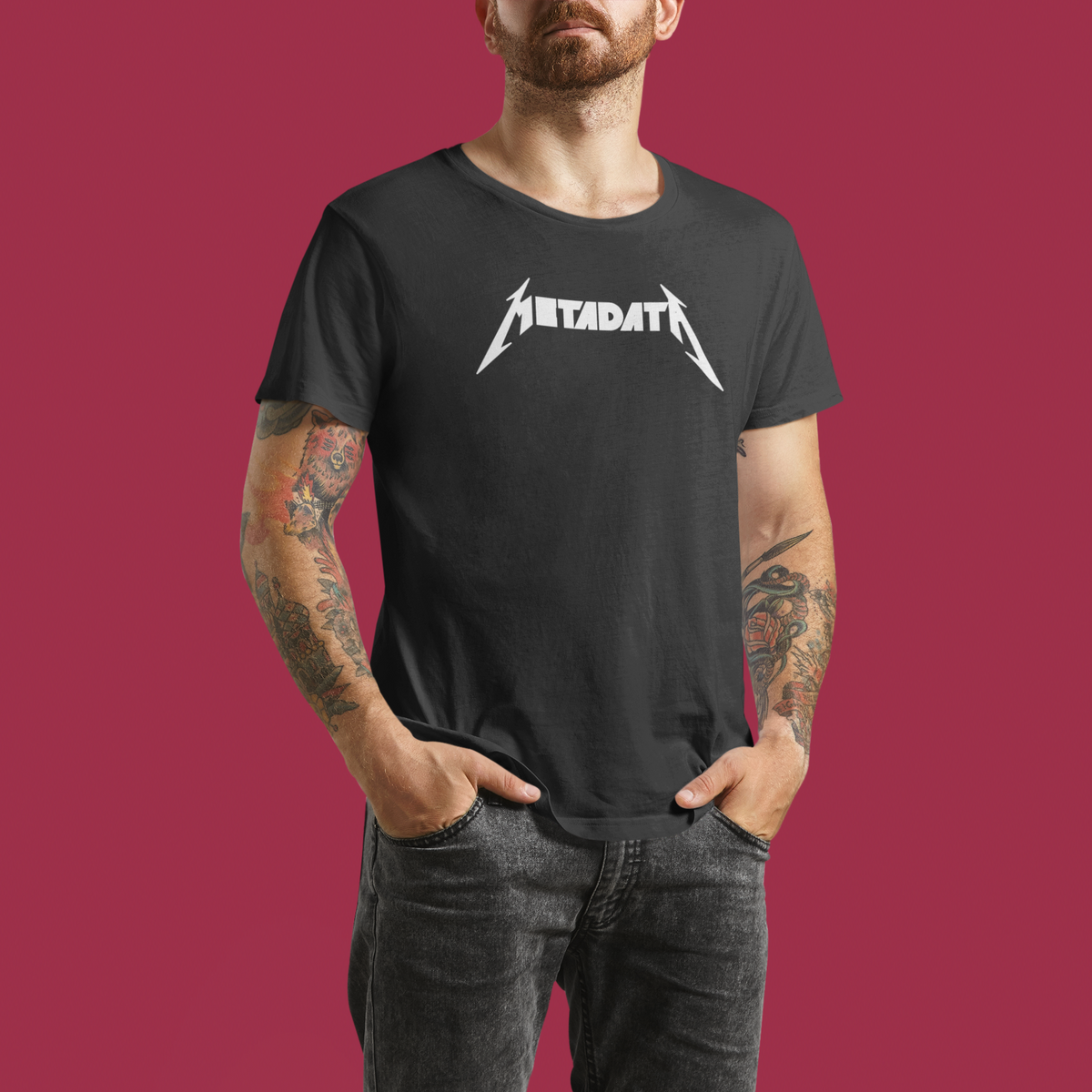 'Metadata' t-shirt in charcoal, tattooed man wearing it on red background, funny data science gift