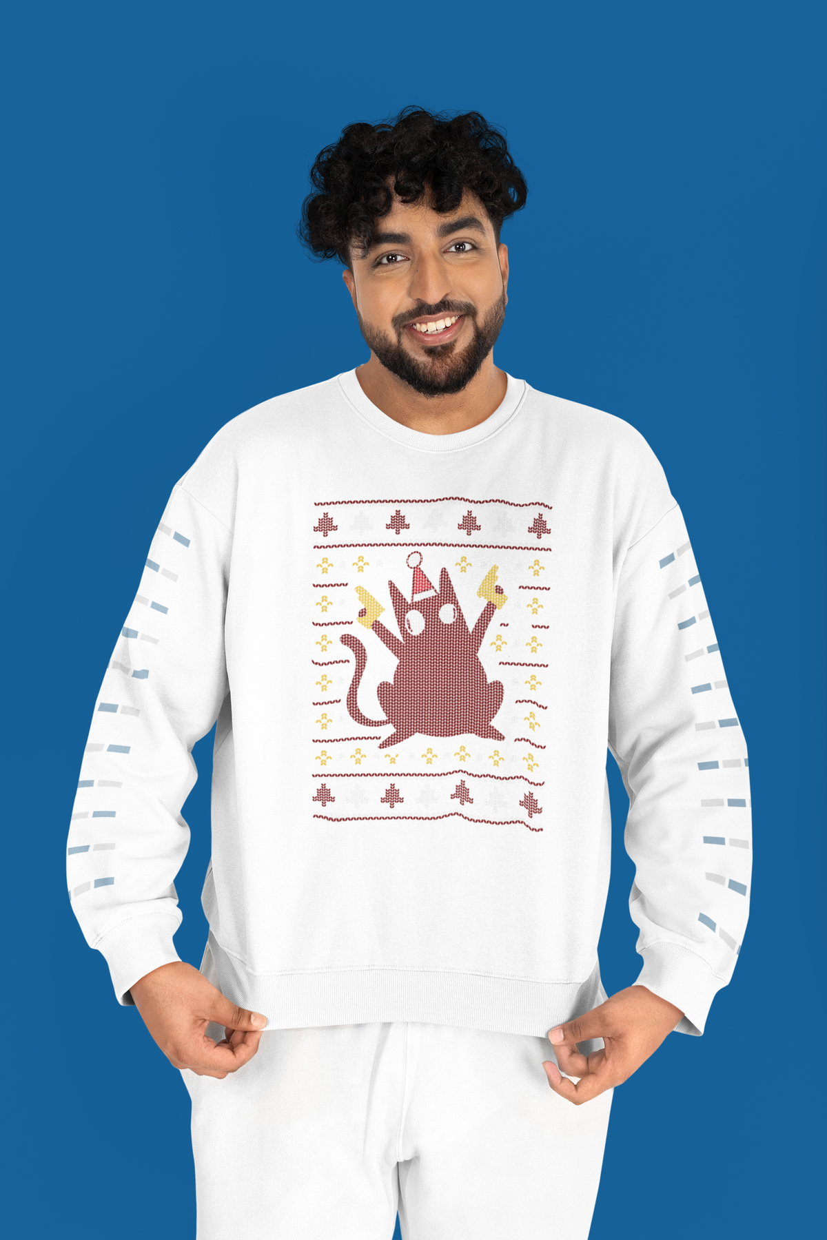 Ugly Sweater Cat sweatshirt in white, man wearing it against a blue backdrop, funny holiday cat gift