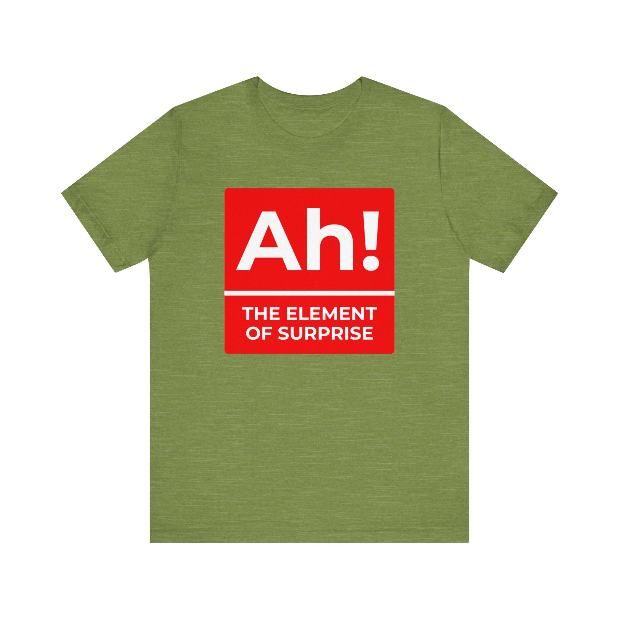 The "Ah! the Element of Surprise" T-shirt is a comfy tee perfect for nerd culture enthusiasts, featuring a green design with a periodic table twist: "Ah!" in red and white above "The Element of Surprise," making it an ideal science-inspired conversation starter.