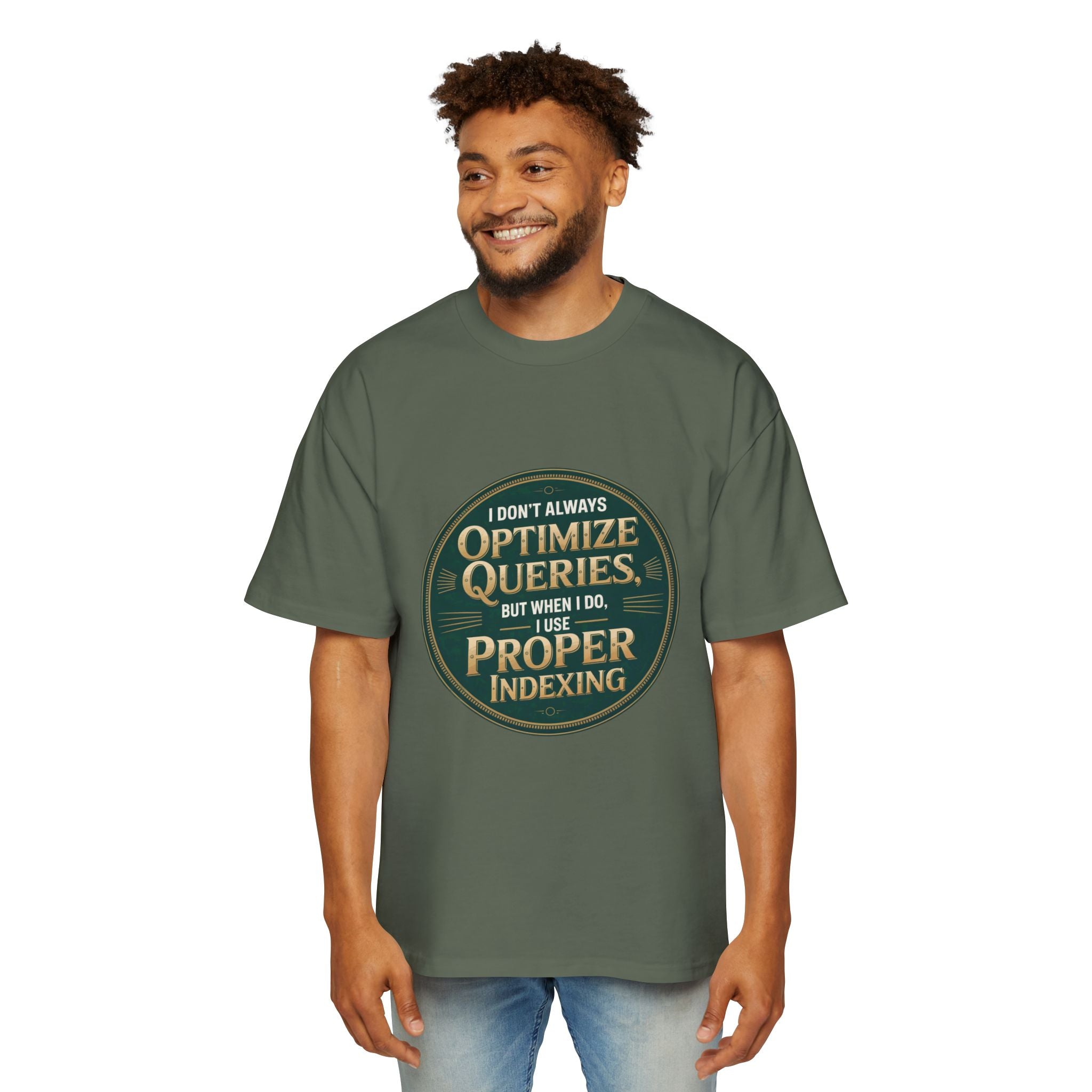A man wearing the "I Don't Always Optimize Queries - Heavy Oversized Tee," featuring a boxy fit and the text "I don't always optimize queries, but when I do, I use proper indexing" on the front.