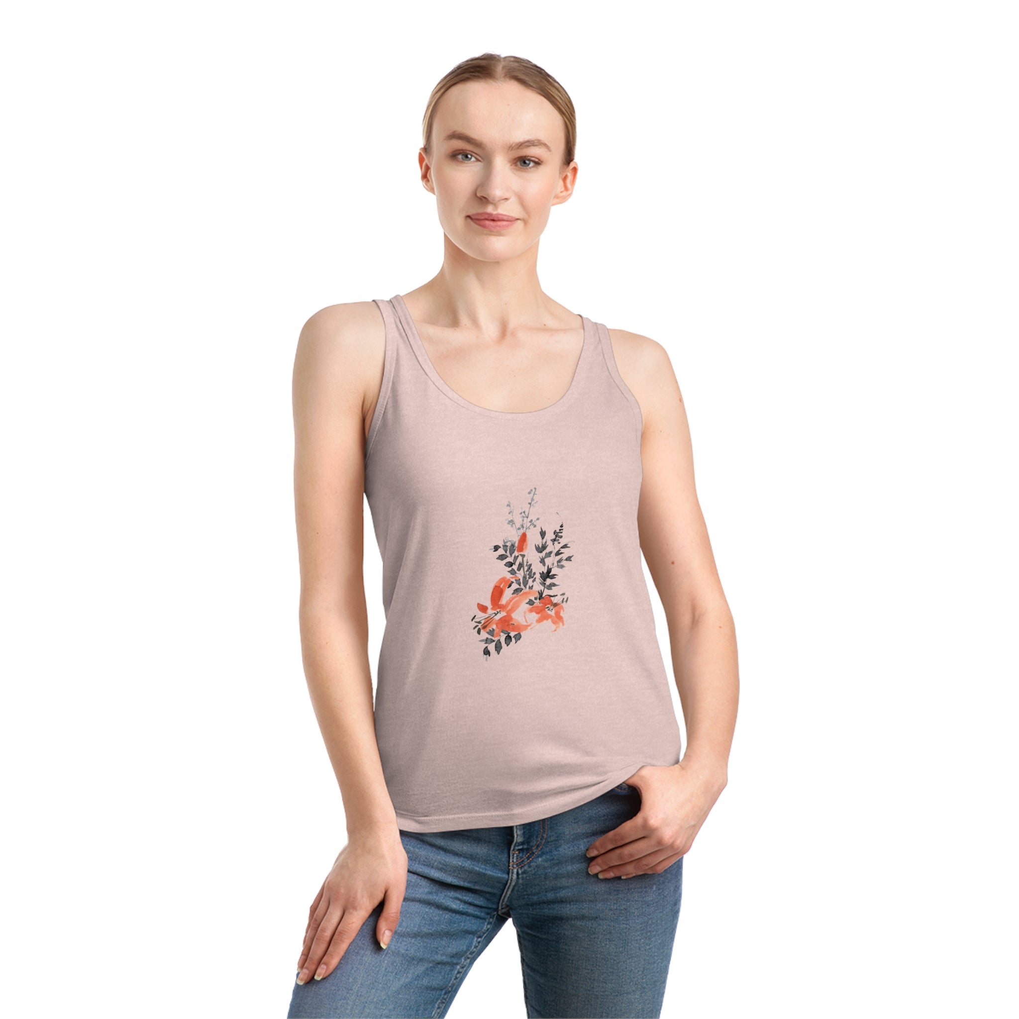 Wearing a Flowers Women's Dreamer Tank Top in organic cotton, light pink with a floral design, the person stylishly pairs it with blue jeans against a clean white background.