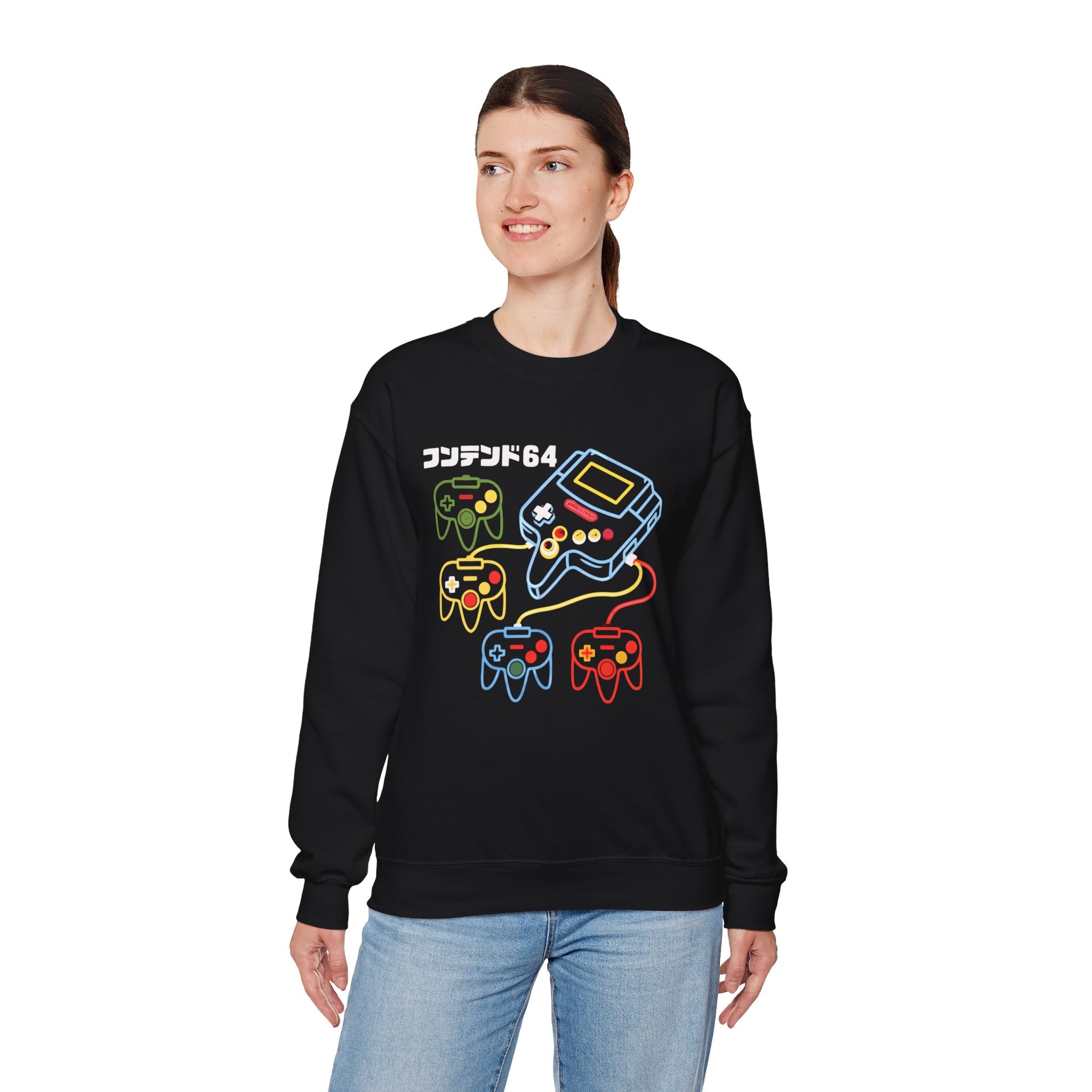 Woman wearing the Game Console - Sweatshirt, featuring neon sci-fi graphics of a console and four controllers, bold Japanese text, and the number 64—ideal comfort for long coding sessions.