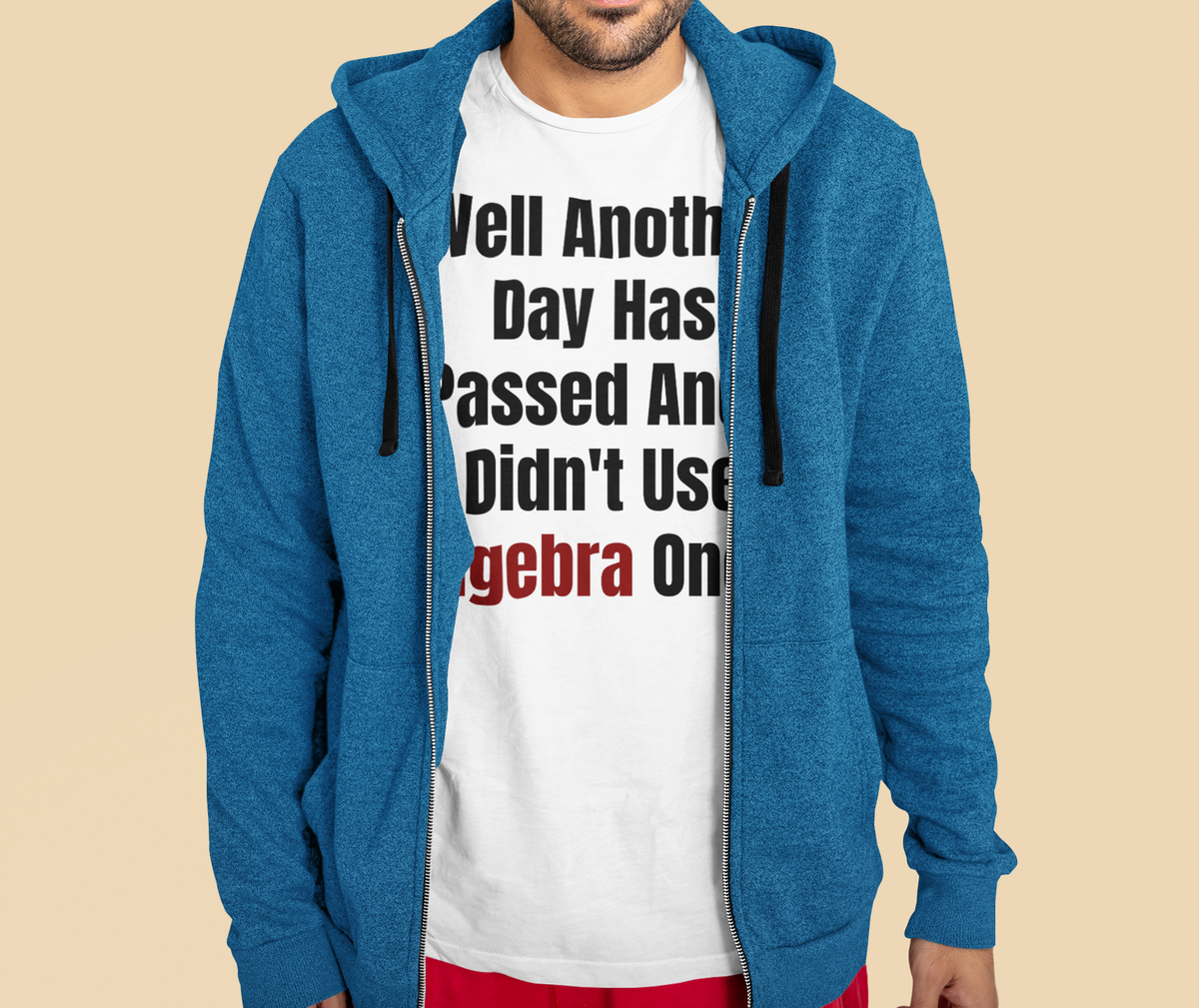 "Well Another Day Has Passed And I Didn't Use Algebra Once" t-shirt in white, man in a blue cardigan