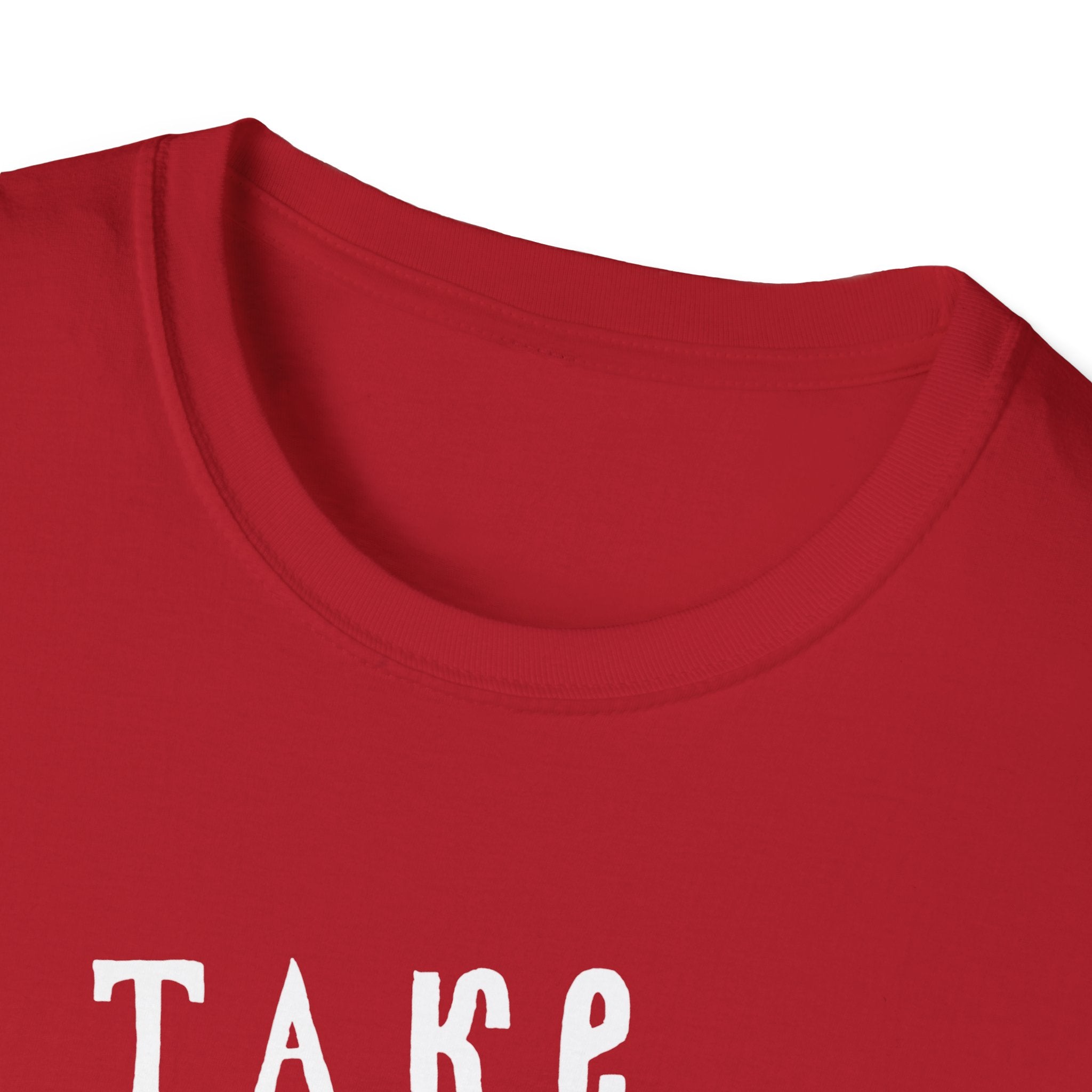 Close-up of a red "Take Me to the Ocean" T-Shirt with partial white text "TAKE," showcasing the neckline and collar stitching that combine comfort and style.