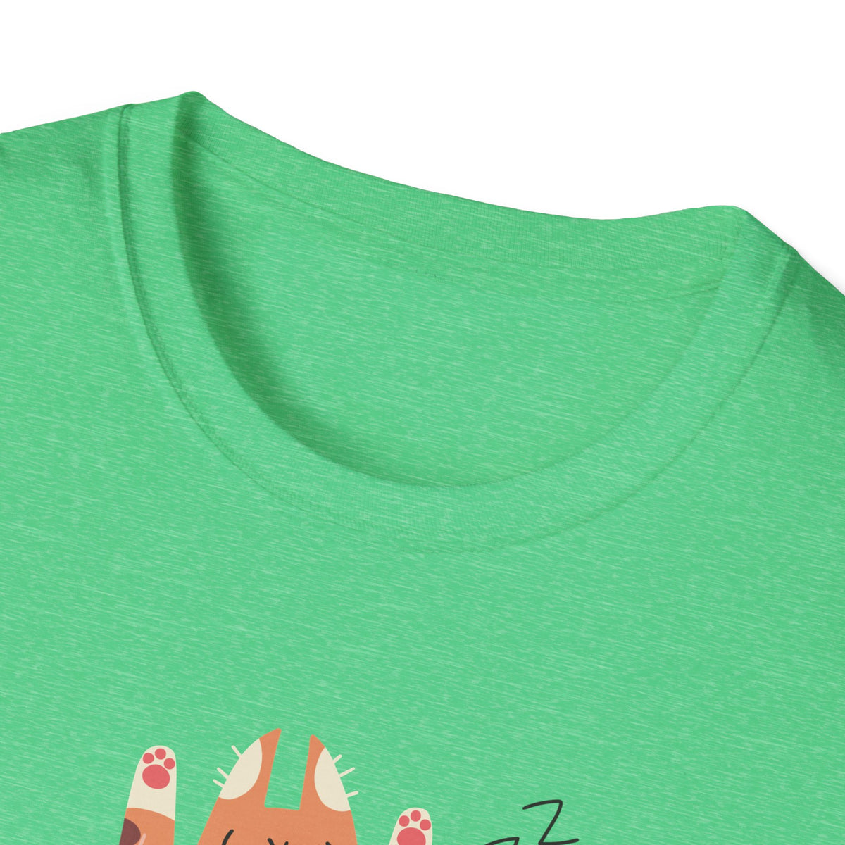 Close-up of You Make Me Go ZZZ sleepy cat print hem on green t-shirt, funny cat lover graphic detail