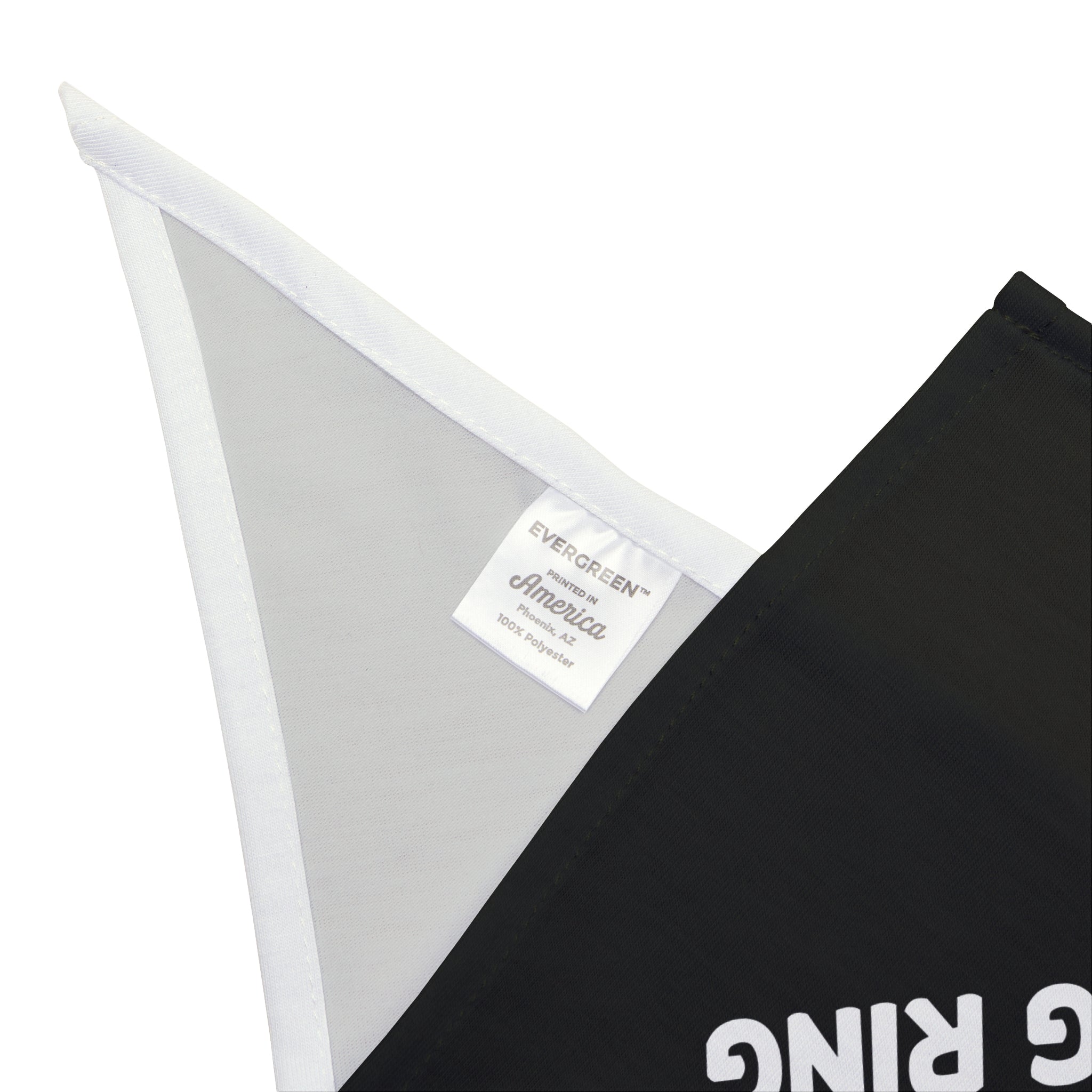 Corner of a black fabric item showcasing a white tag with the brand "EVERGREEN America" and material details, embodying comfort and style in the "This Discussion Deserved a Boxing Ring - Pet Bandana".