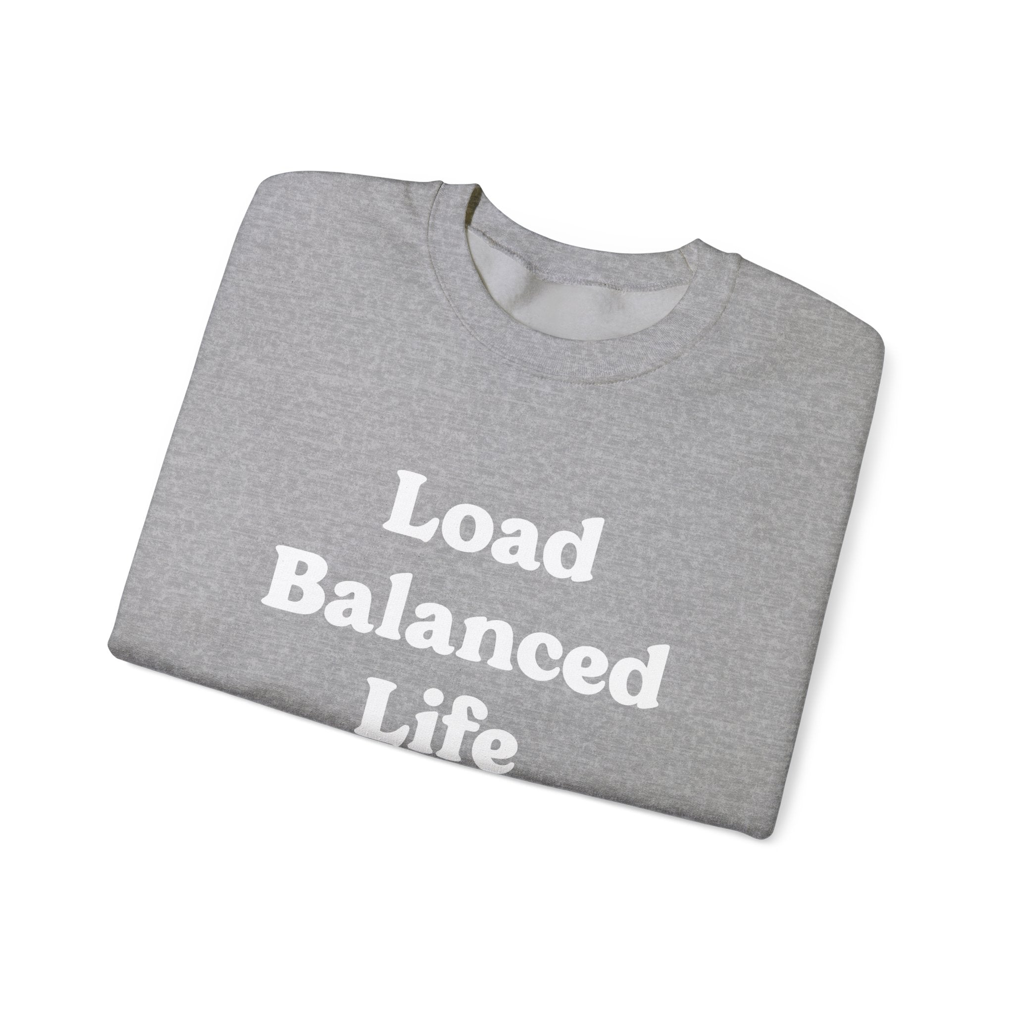 Experience the perfect blend of cozy comfort and practicality with the folded gray "Load Balanced Life" sweatshirt, showcasing its design with elegantly printed crisp white text on the front.