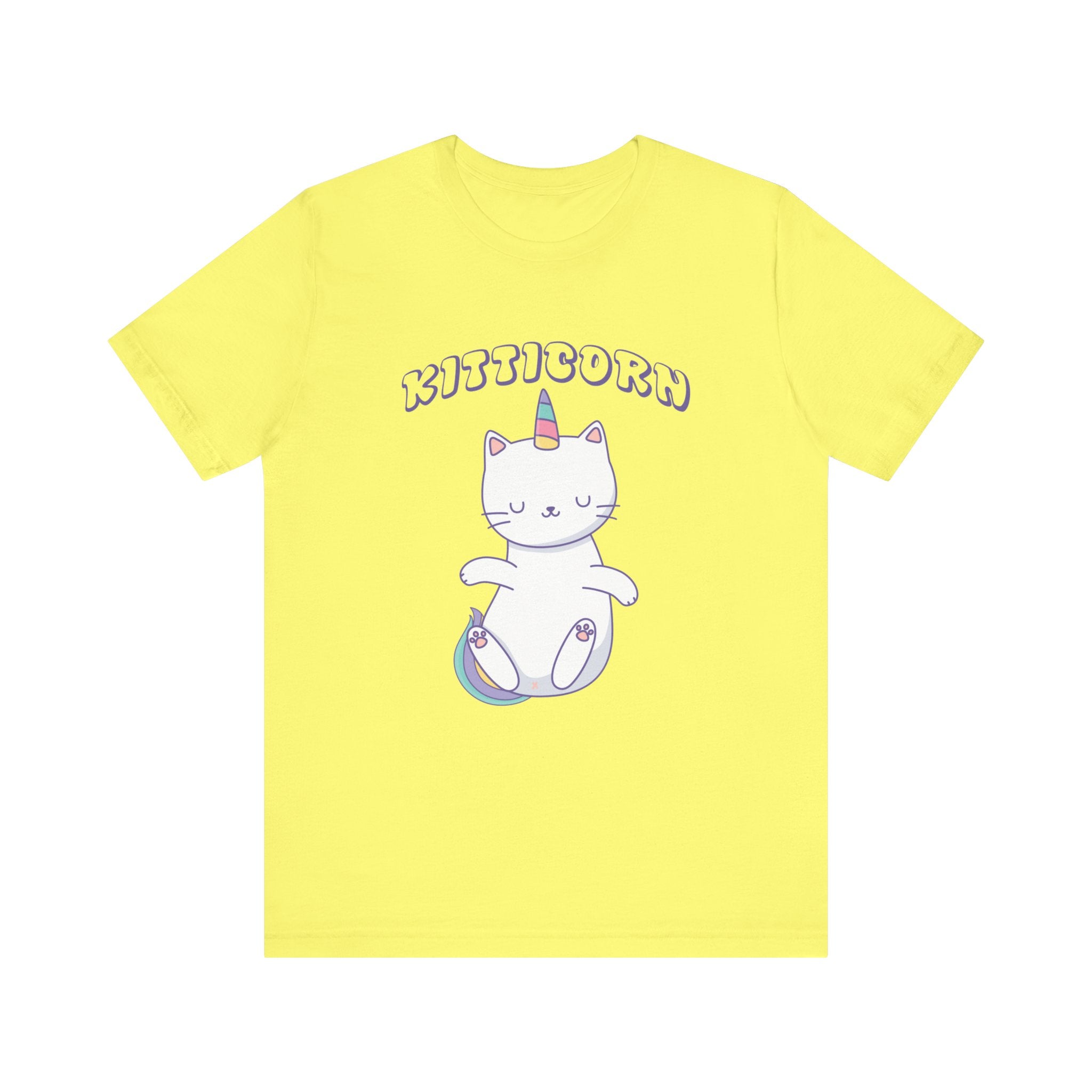 Discover the charm of unicorn magic with our delightful yellow Kitticorn tee, showcasing a whimsical cartoon white cat with a unicorn horn, perched on a rainbow under the playful "Kitticorn" label. The ideal mix of fantasy and fun for kitten enthusiasts.