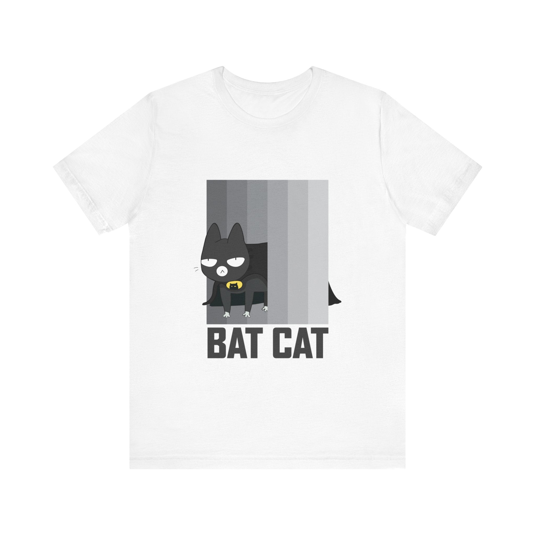 Introducing the BATCAT T-Shirt, a unisex piece showcasing a cartoon superhero cat adorned with a cape and mask, positioned next to vertical stripes. Crafted from soft cotton, this whimsical design is completed with the phrase "Bat Cat" under the image.