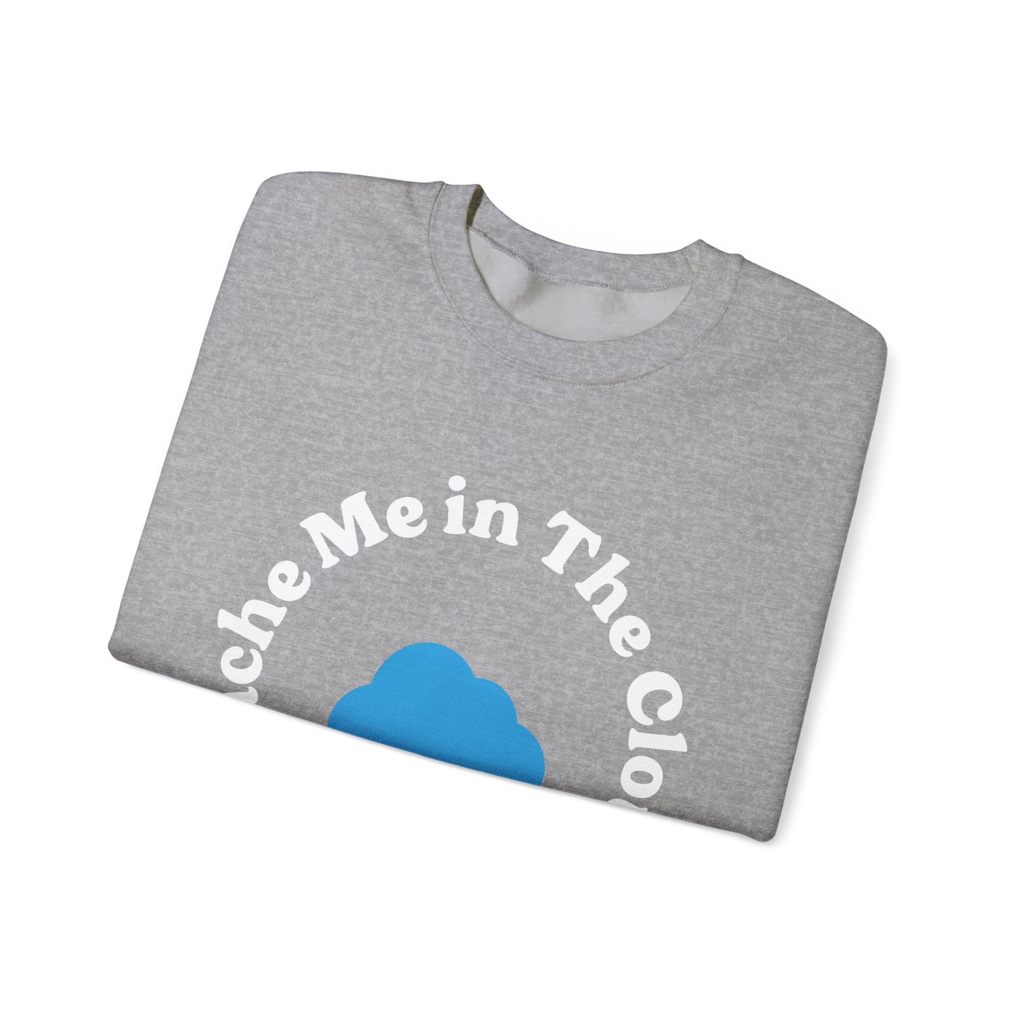 Embrace your dreamy side with the "Cache Me in The Cloud" sweatshirt, featuring gray fabric adorned with white text that says "Catch Me in The Clouds" and a blue cloud graphic. This chic piece is ideal for dreamers who desire both comfort and style.