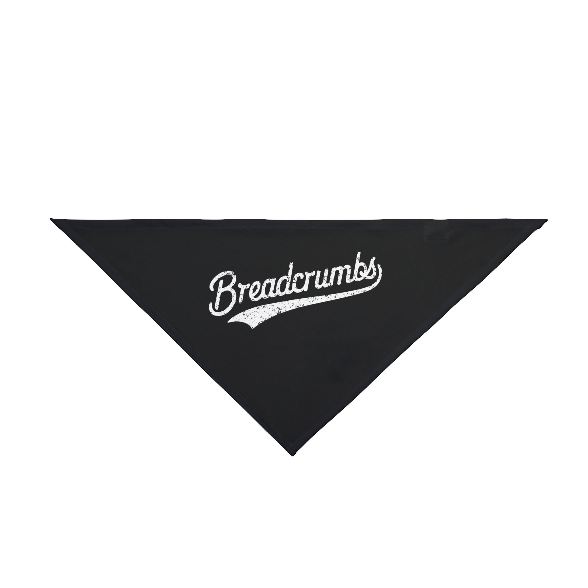 The Breadcrumbs - Pet Bandana is a black, triangular accessory featuring "Breadcrumbs" in white cursive—a stylish way for your pet to show geek pride.