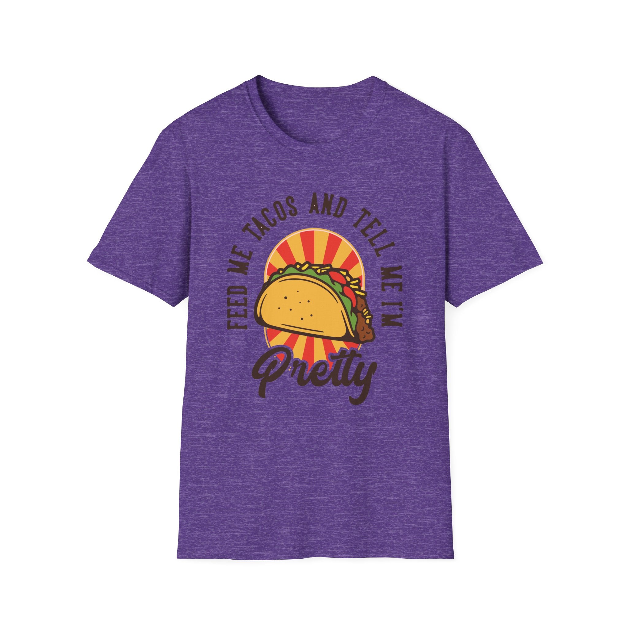 The "Feed Me Tacos and Tell Me I'm Pretty" Purple Taco T-Shirt showcases a whimsical taco design alongside the bold lettering, making it an ideal choice for taco lovers to stylishly enjoy Taco Tuesdays.