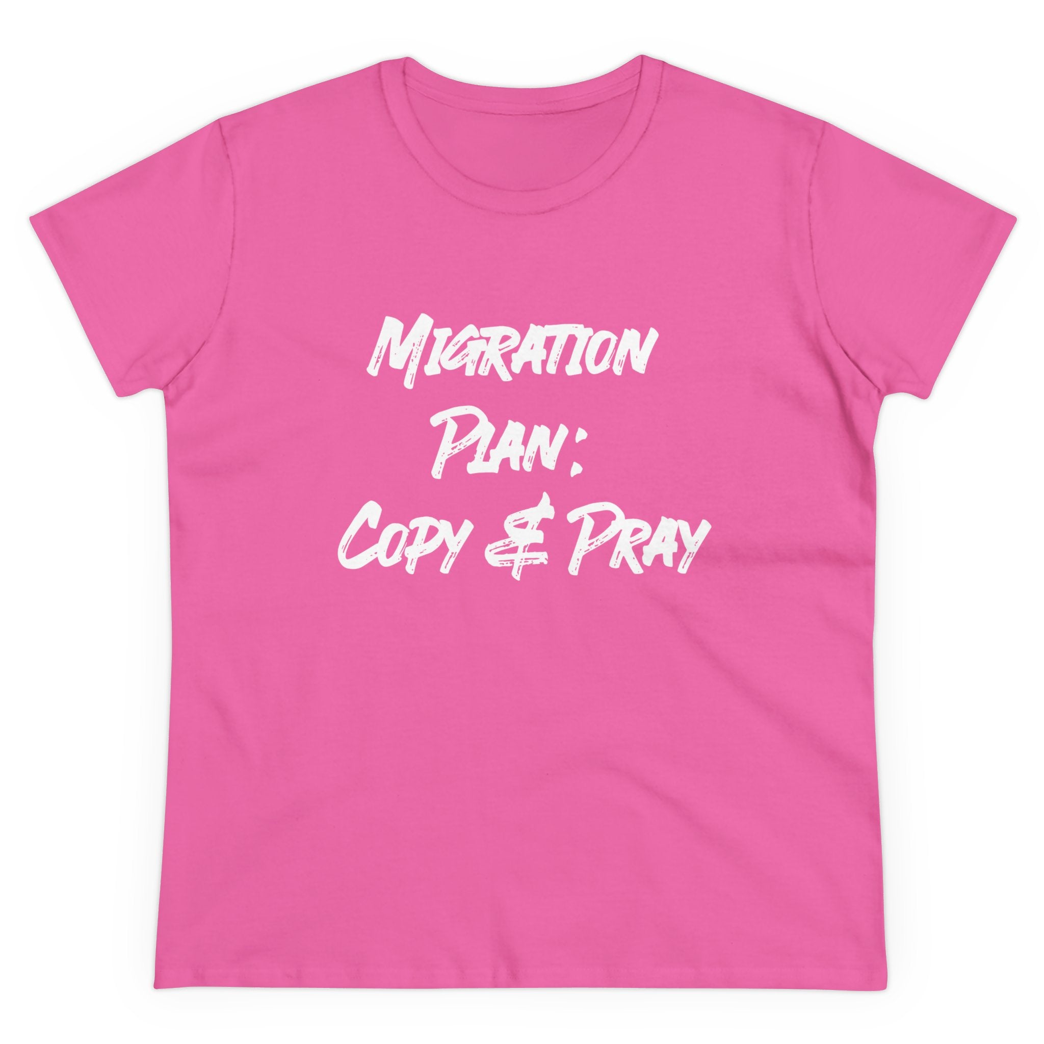 Introducing the "Migration Plan Copy and Pray - Women's Tee," a playful pink cotton shirt adorned with white text that reads, "Migration Plan: Copy & Pray." It's the perfect choice for those who enjoy adding a touch of humor to their wardrobe, seamlessly blending comfort and style.
