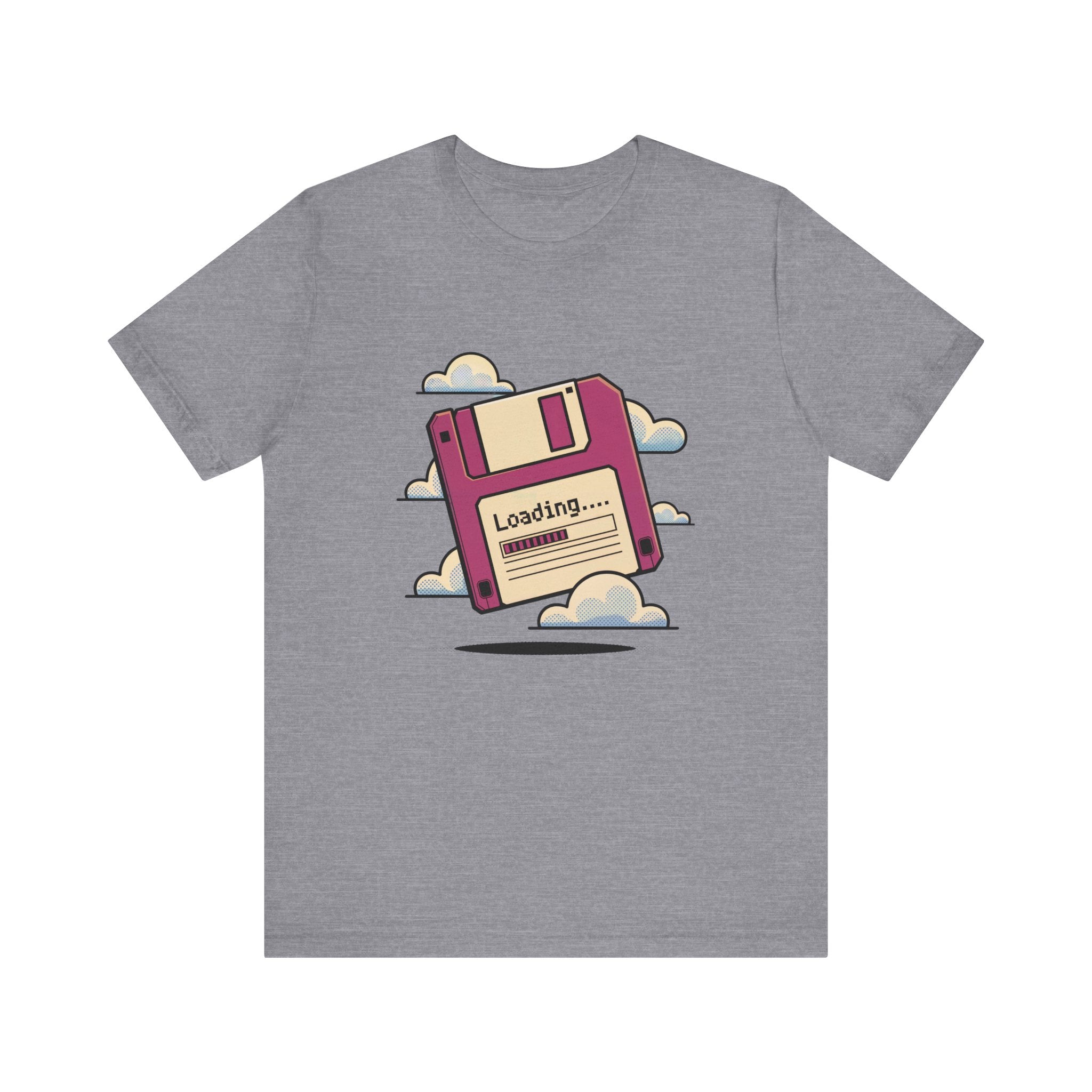 The Floppy disk -T Shirt is a gray cotton tee with a pink floppy disk surrounded by clouds and "Loading..." on the label, combining comfort and unique design.