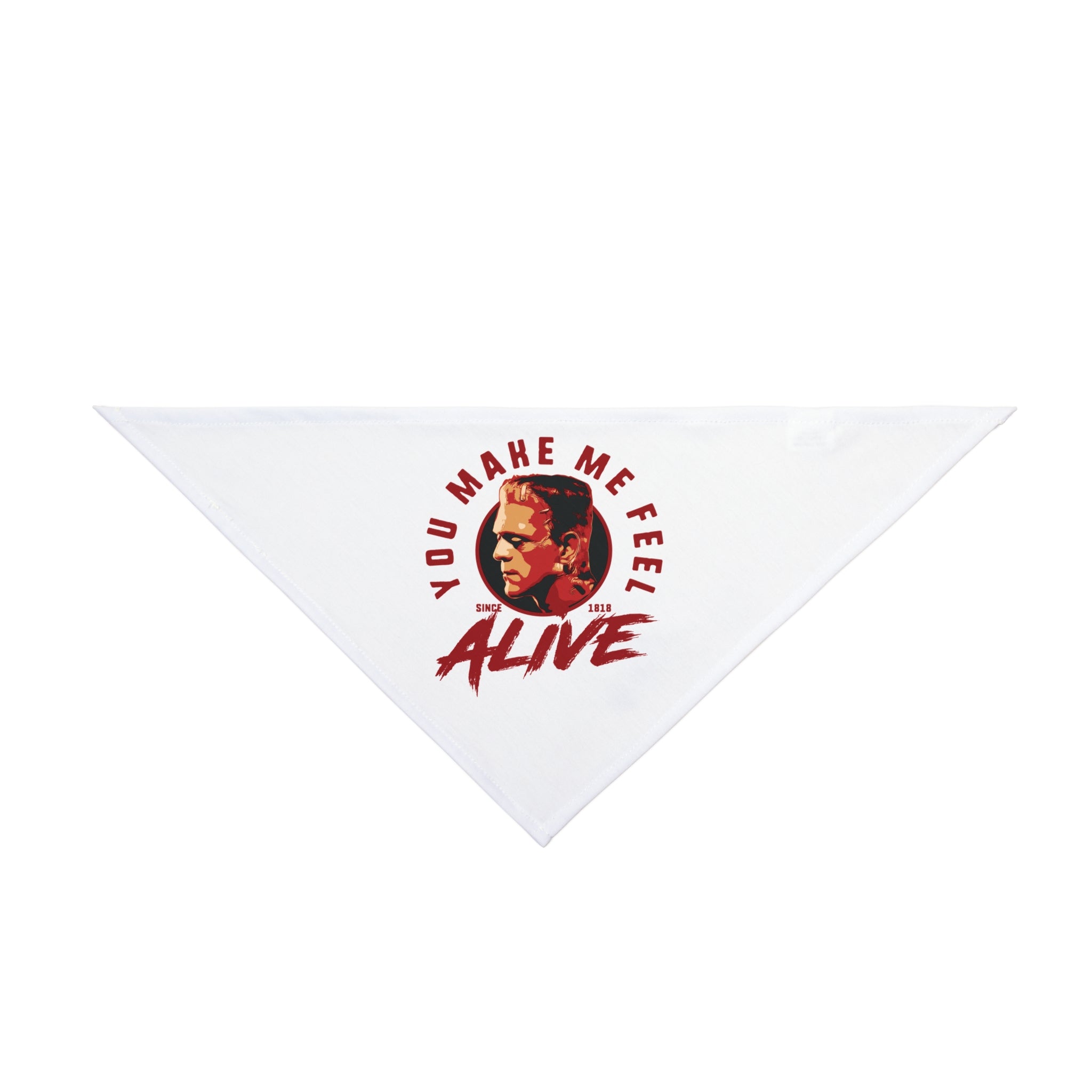 The Alive- Pet Bandana is a white, triangular accessory featuring a graphic of a person's face and "YOU MAKE ME FEEL ALIVE" in bold red—perfect for making your furry friend stand out.