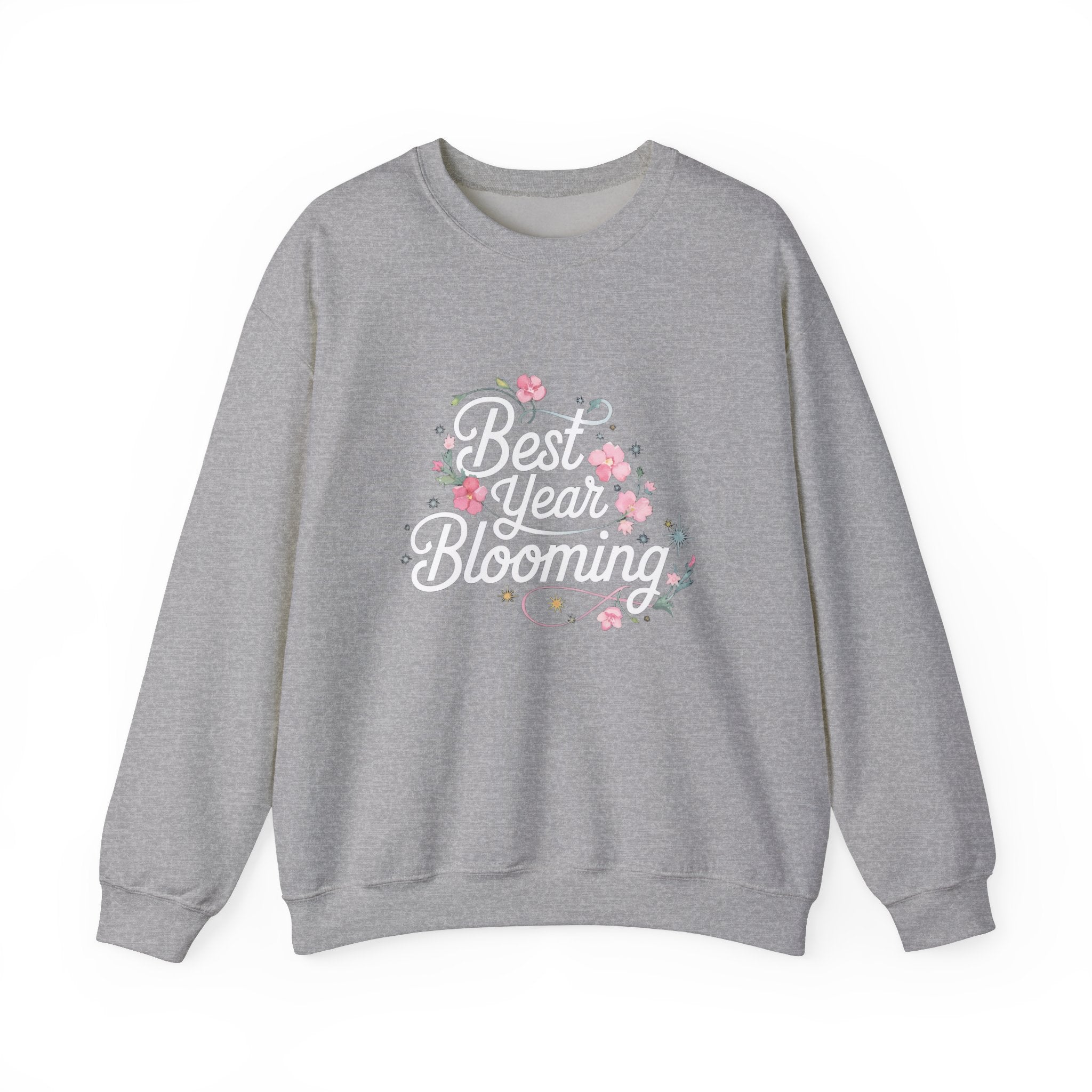 The "Best Year Blooming" Sweatshirt features ultra-soft gray fabric, white script text, and pink-green floral designs—perfect for bringing a cheerful touch to your autumn wardrobe.
