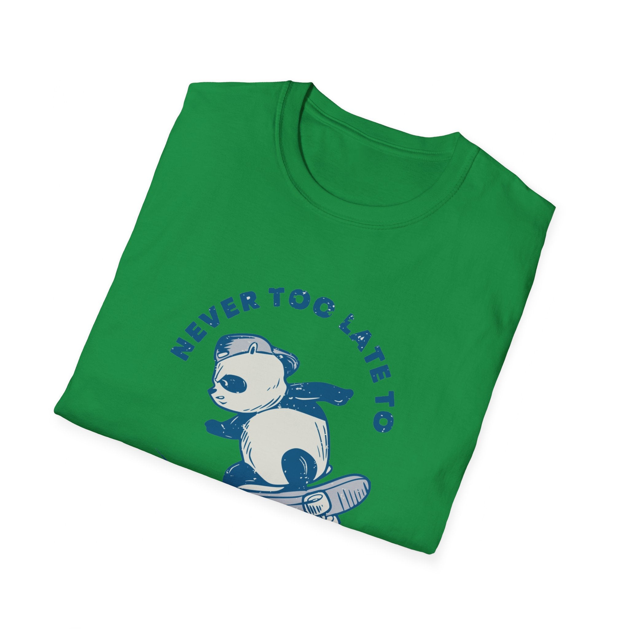 The "Never Too Late to Skate" T-shirt in green showcases a vibrant print of a panda skateboarding in a cape, surrounded by the playful slogan. Show off your passion for skating with this fun design.