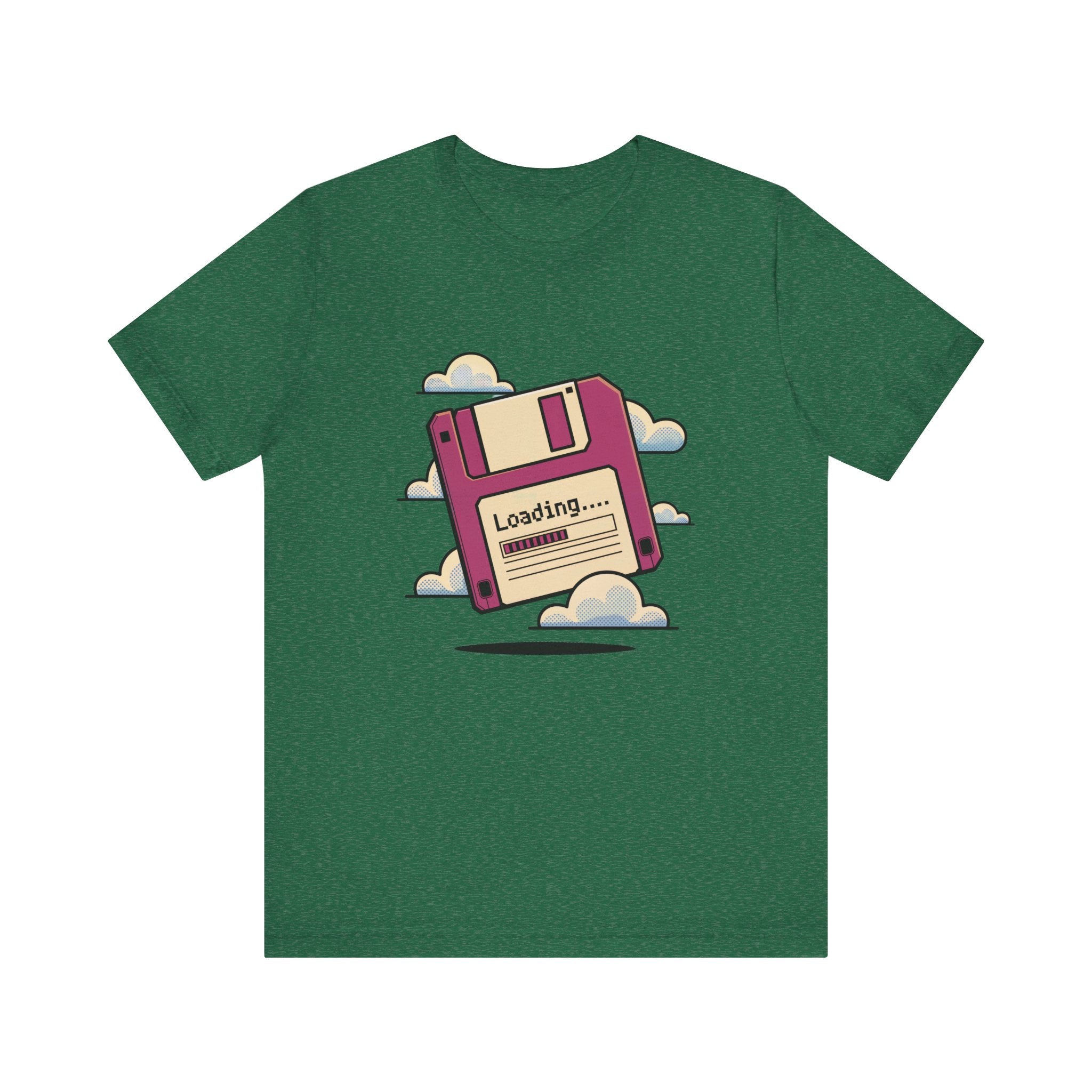 The Floppy disk -T Shirt is a soft cotton green tee with a pink floppy disk labeled "Loading..." surrounded by clouds. Tapered shoulders give it a modern look.
