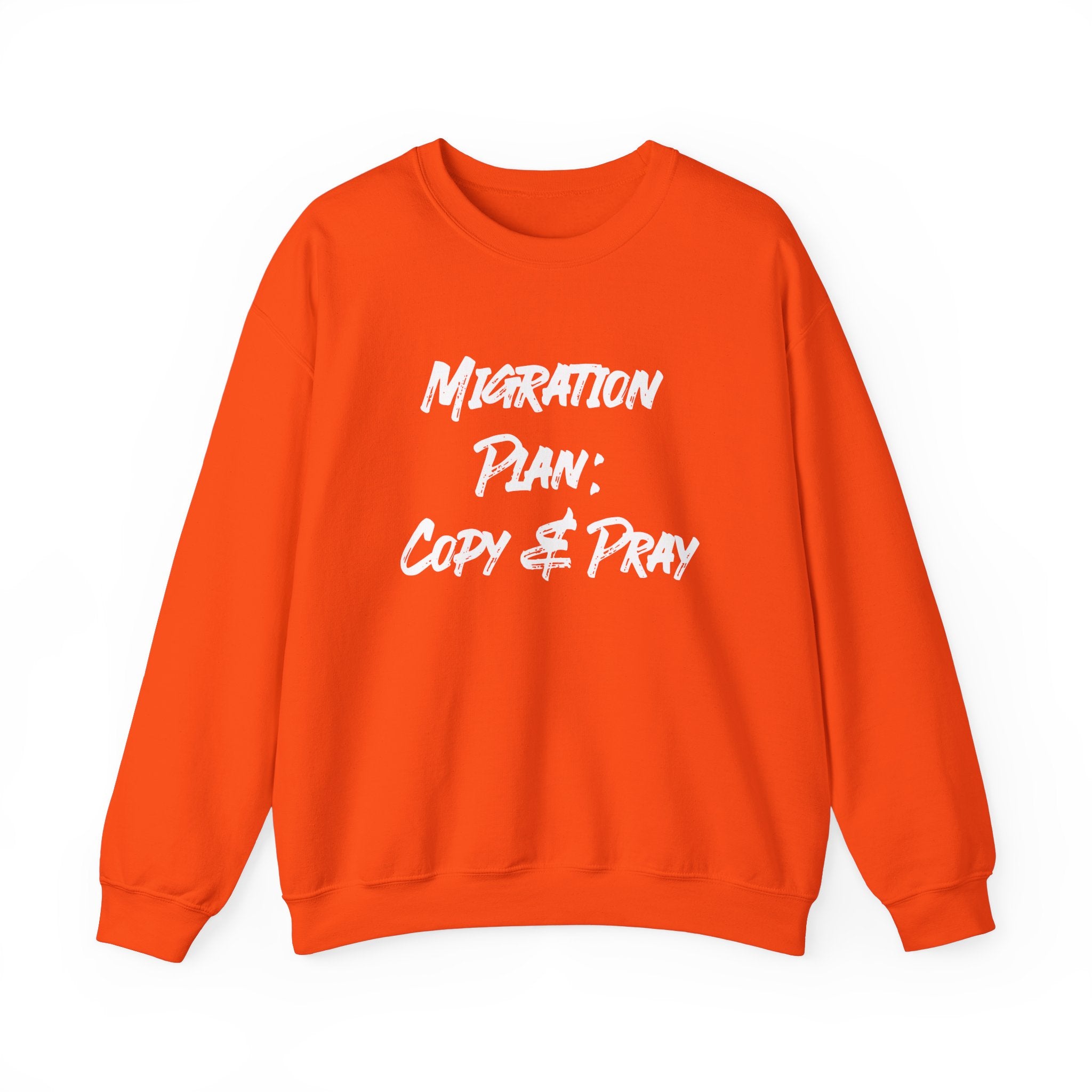 Stay cozy in this orange "Migration Plan Copy and Pray" sweatshirt, perfect for cooler weather. Its whimsical white text design adds a fun touch to your casual style.