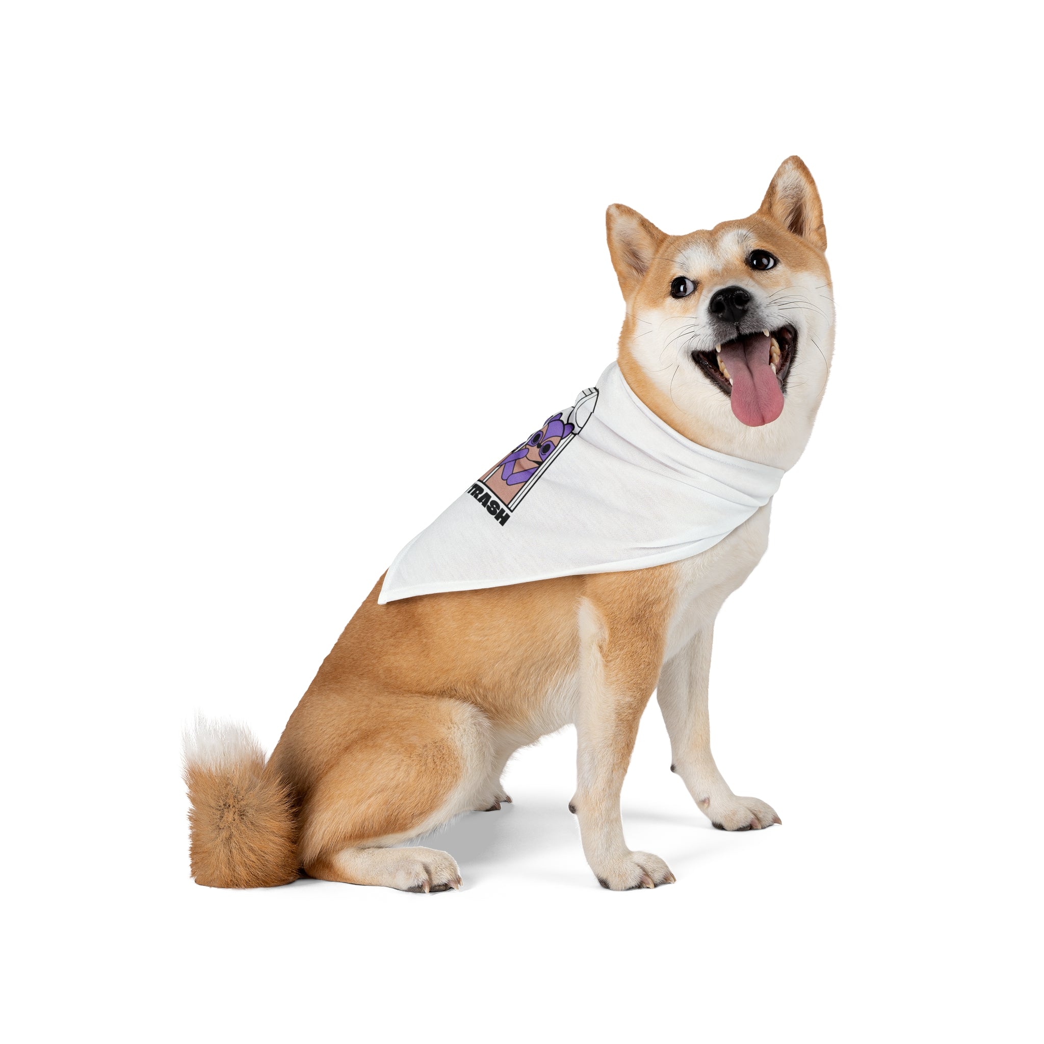 A Shiba Inu sits slightly sideways, wearing the "Eat Trush - Pet Bandana" featuring a purple nerd-culture graphic on white, against a plain white background.