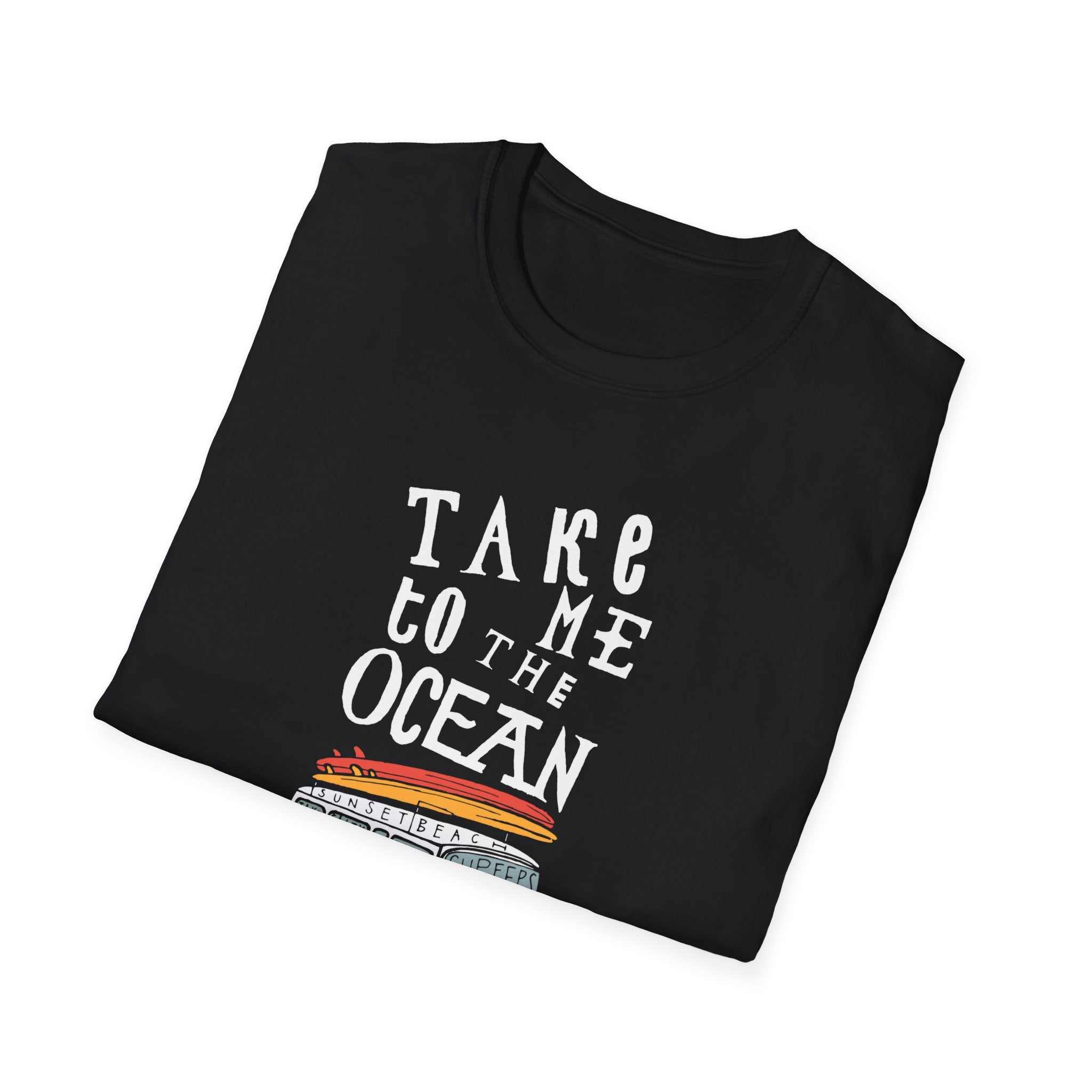 Enjoy comfort and style with the folded black "Take Me to the Ocean" T-Shirt, featuring an elegant text design alongside a beach sunset illustration. Perfect for those who love serene coastal vibes.