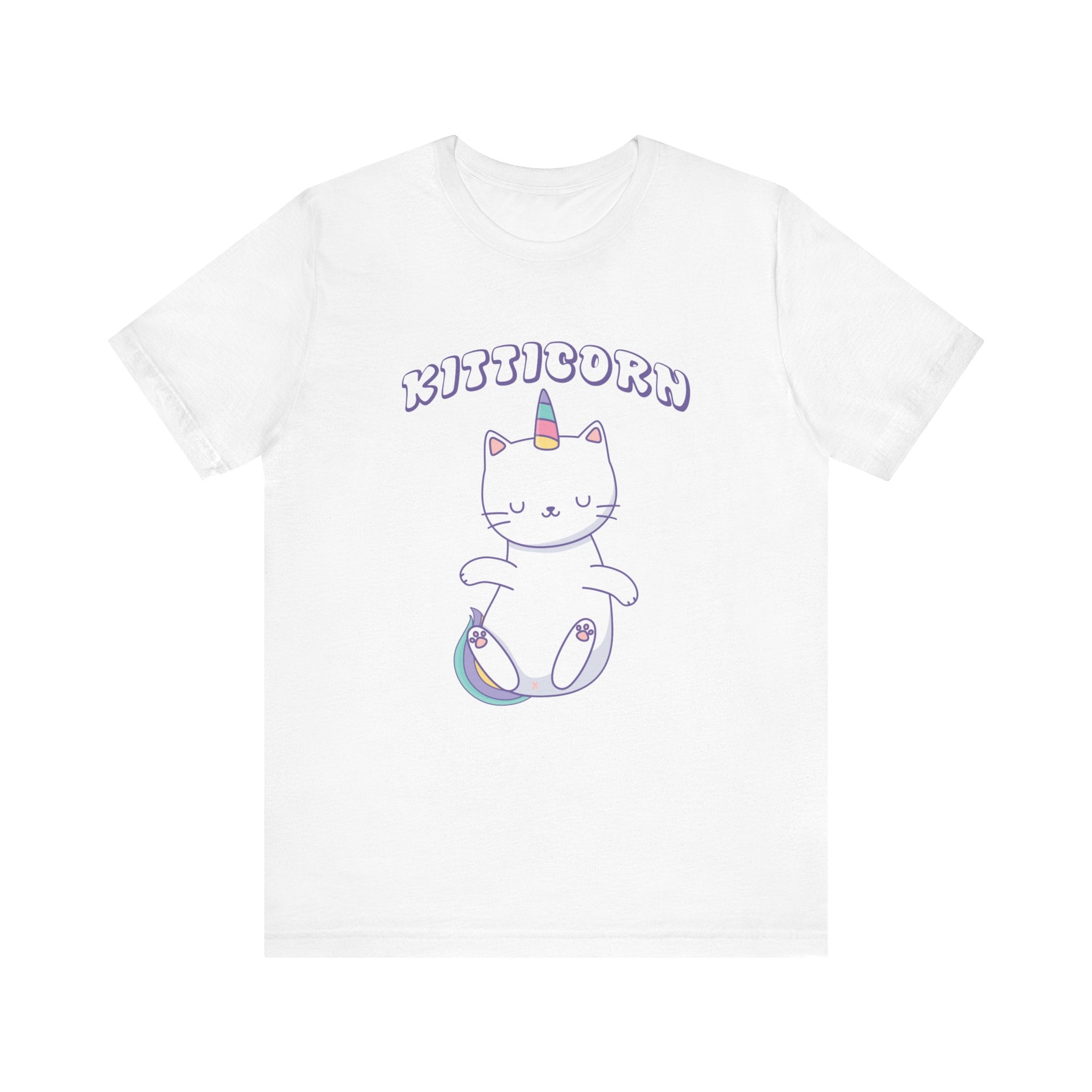Explore the whimsical Kitticorn tee: a white T-shirt featuring a cartoon cat with a unicorn horn, rainbow paws, and tail. The word "KITTICORN" arches above, embodying magical vibes.
