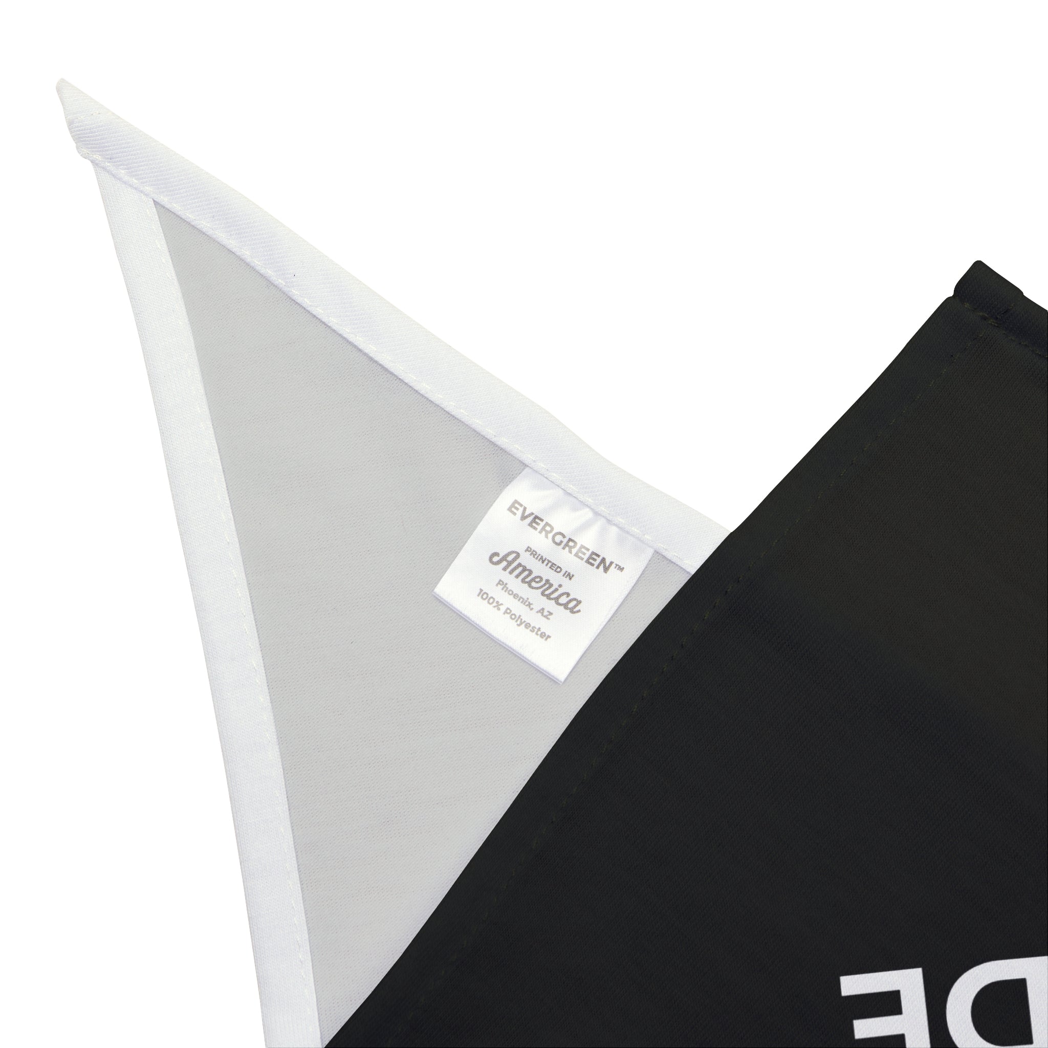 Close-up of the "I'm The Hottest Node - Pet Bandana," a stylish and pet-safe black and white bandana made from 100% polyester, featuring a tag that reads "Evergreen America.
