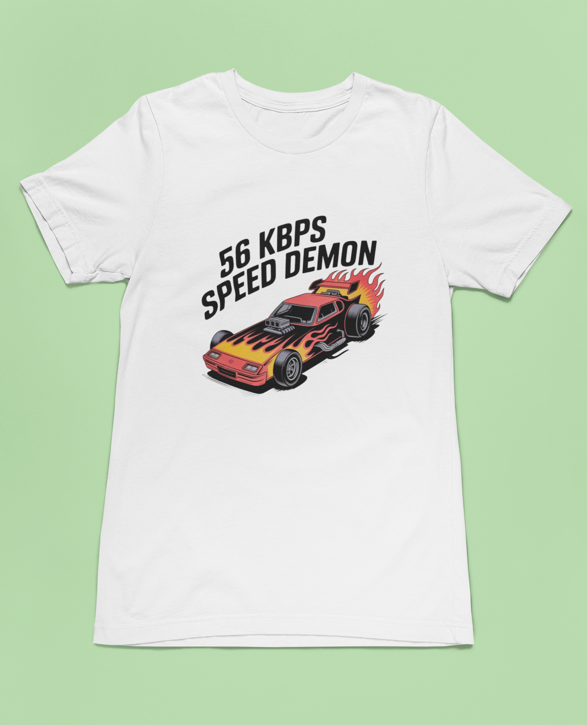 '56 Kbps Speed Demon' t-shirt in white, flat lay front on green background, funny nostalgic gamer gift