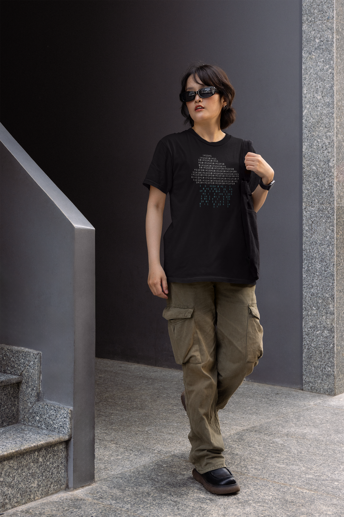 Binary rain cloud graphic tee in black, man walking wearing it in cargo pants, funny geek gift