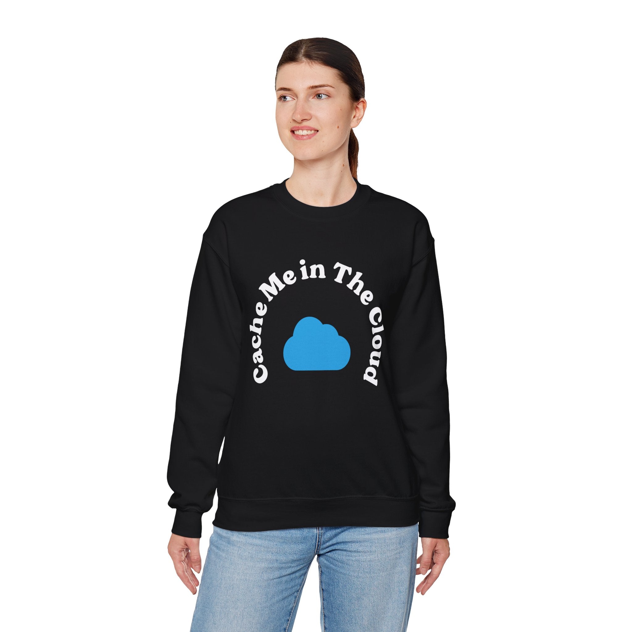 A cloud-savvy individual models the "Cache Me in The Cloud - Sweatshirt," a chic black garment featuring a vibrant blue cloud graphic, and is gracefully posed against a plain white backdrop.