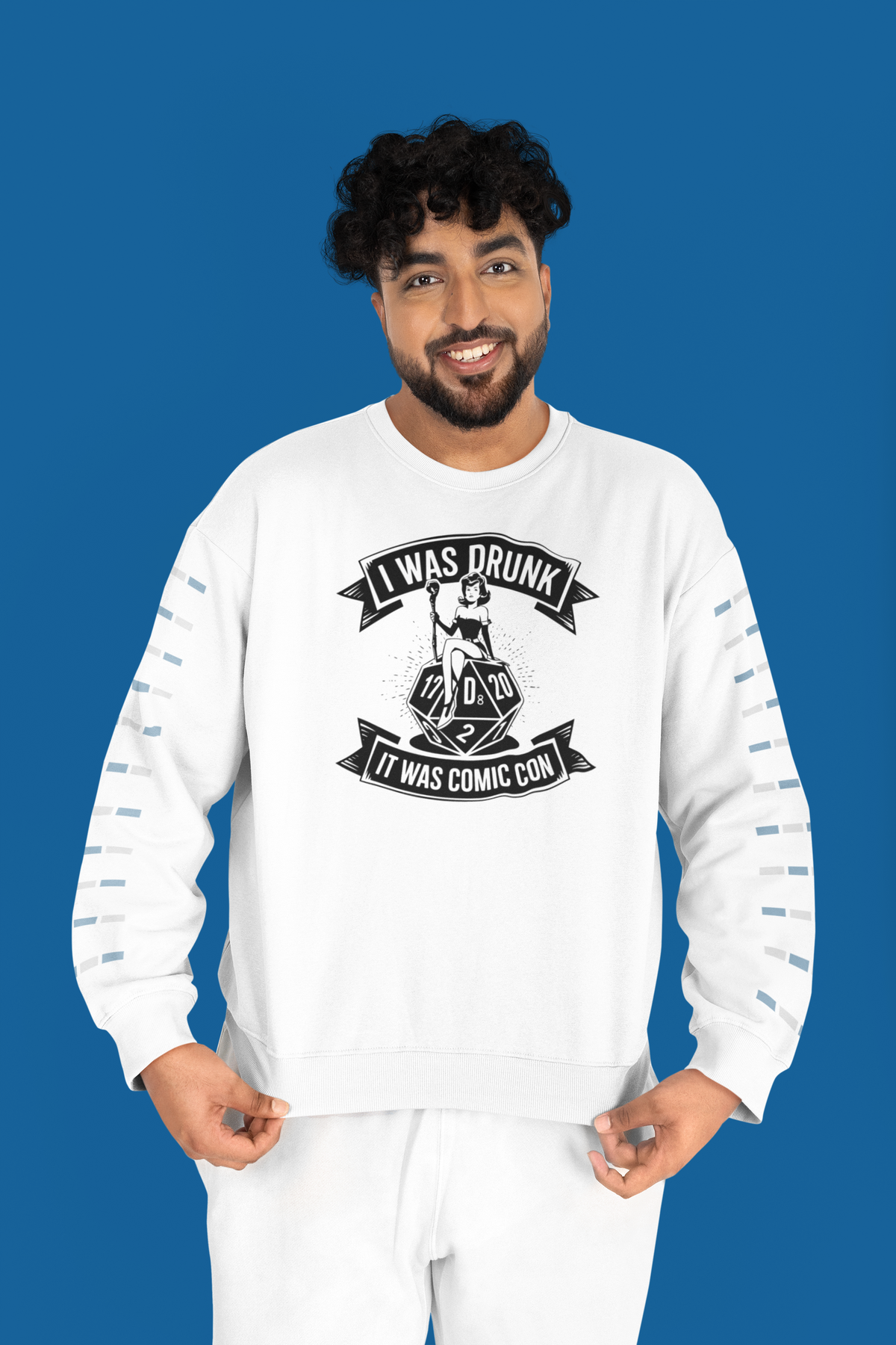 'I Was Drunk It Was Comic Con' sweatshirt in white, man wearing it on blue background, funny con gift