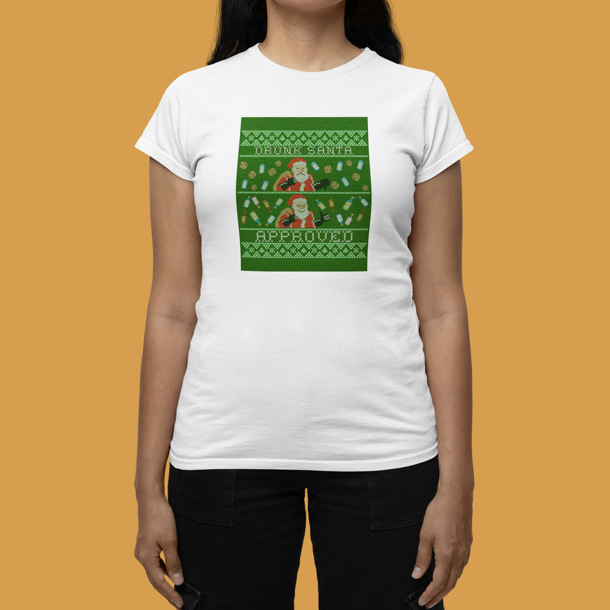 'Drunk Santa Approved' Santa graphic women's tee in white, woman wearing it on orange backdrop, funny Christmas gift
