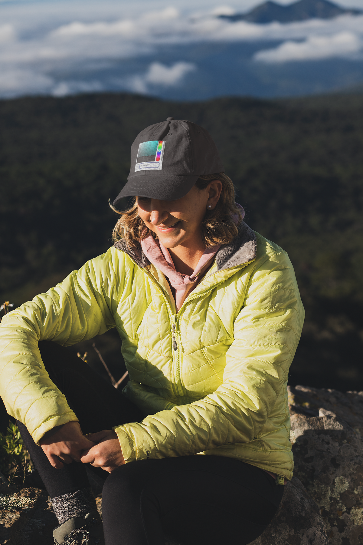 DADA Paint abstract art dad hat, woman on a mountain hike, lifestyle mockup, Geekpsters