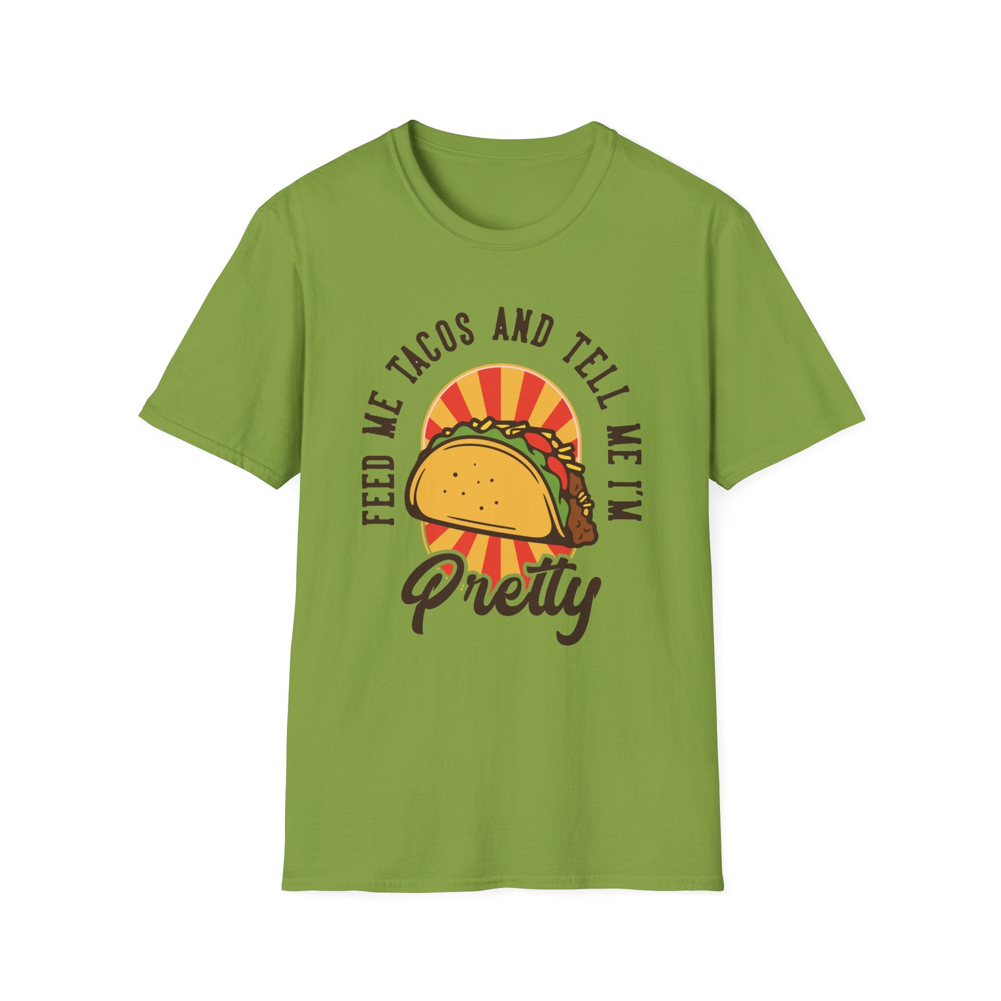 The "Feed Me Tacos and Tell Me I'm Pretty" T-Shirt showcases a green tee adorned with a playful taco graphic and whimsical lettering, making it an ideal choice for taco enthusiasts to sport on Taco Tuesdays.