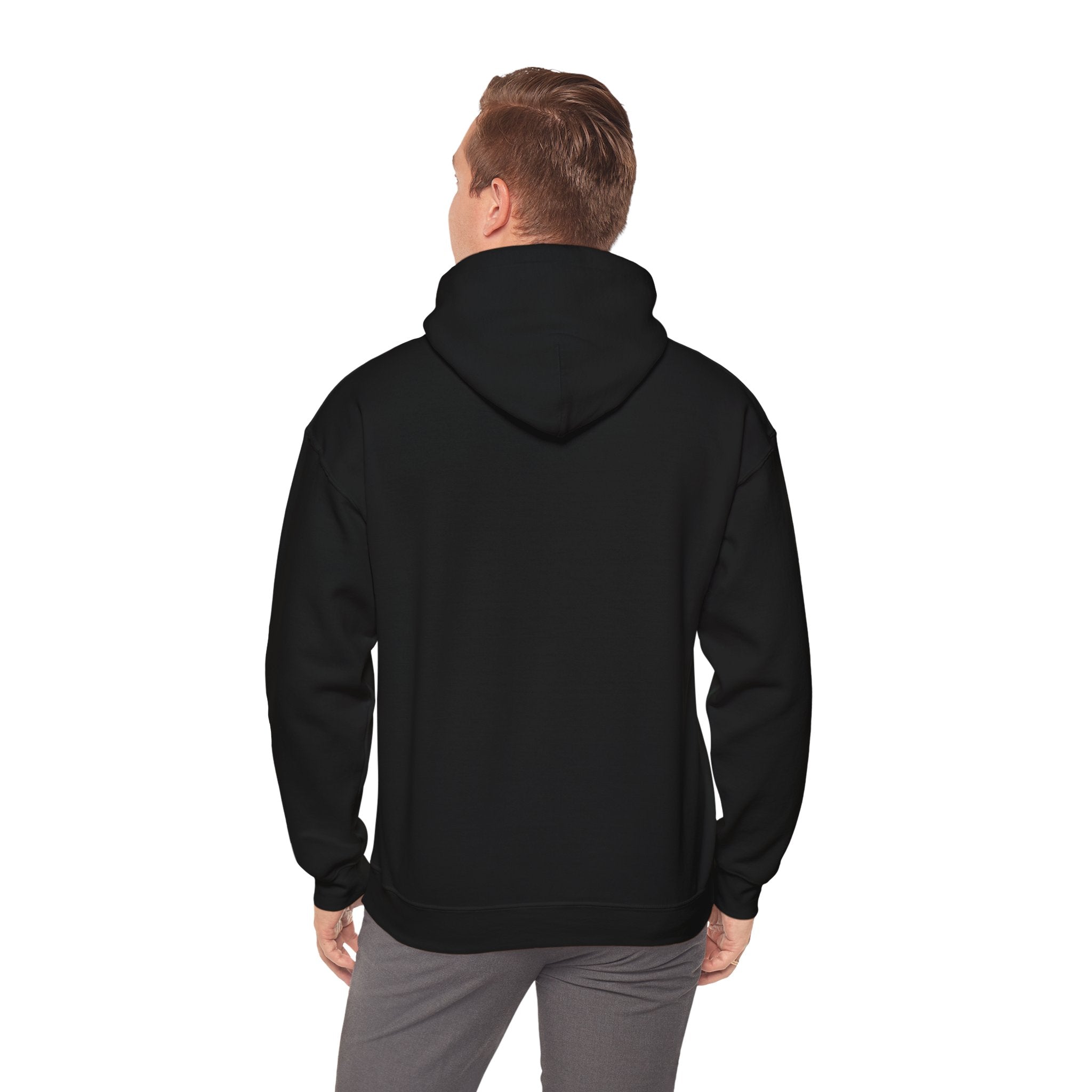 Someone wearing a Binary Rain Cloud - Hooded Sweatshirt in plain black with gray pants stands back to the camera against a white backdrop, showcasing a nerdy look ideal for coding marathons.