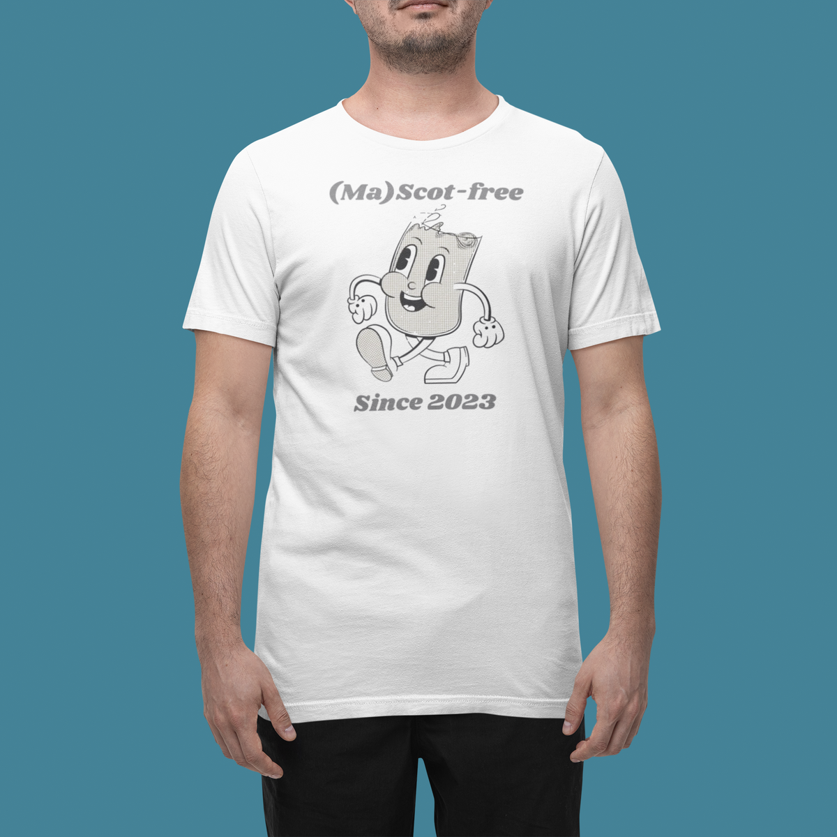 'Ma(scot)-free' t-shirt in white, man wearing it in a studio, T-Shirt mockup, Geekpsters