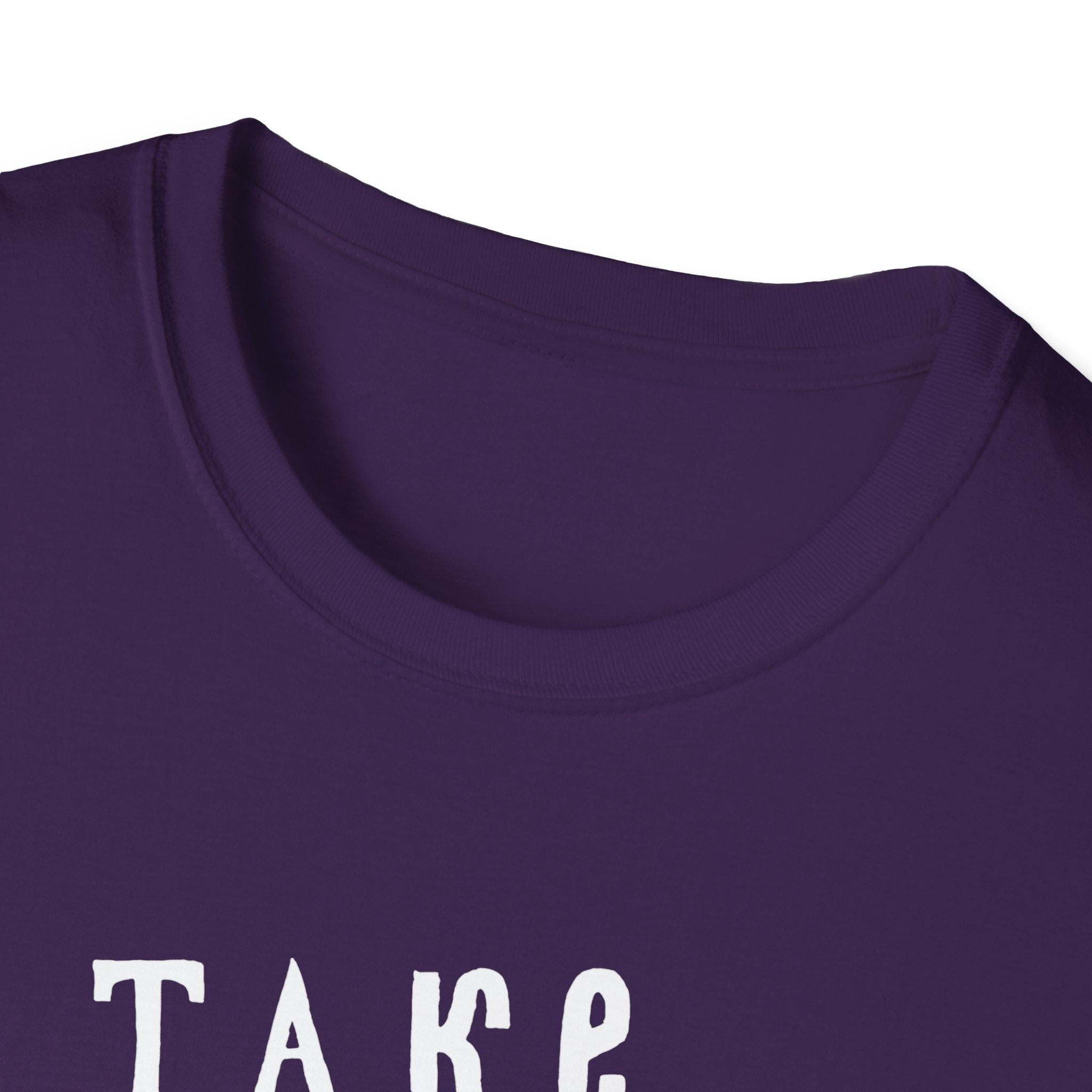 Close-up of a purple Take Me to the Ocean T-Shirt's collar and upper chest area with partially visible white text "TAKE," showcasing its stylish and comfortable blend.