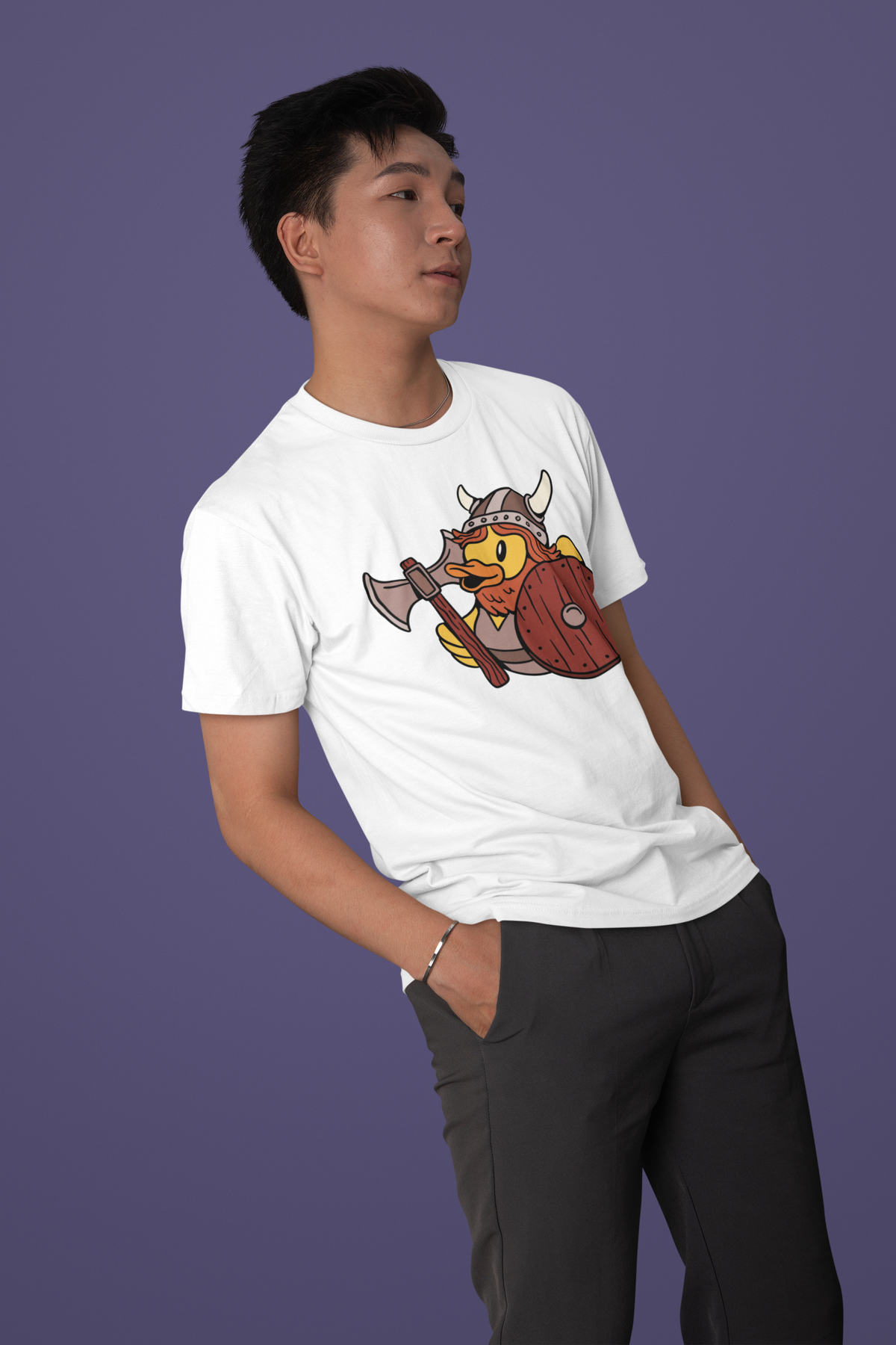 Viking duck t-shirt in white, man model wearing it against a purple background, funny quirky viking gift
