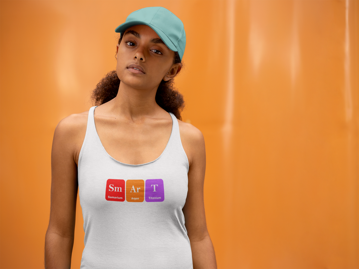 'Sm-Ar-T Periodic Table Women's Tank' in white, woman by an orange wall, Tank Top mockup, Geekpsters