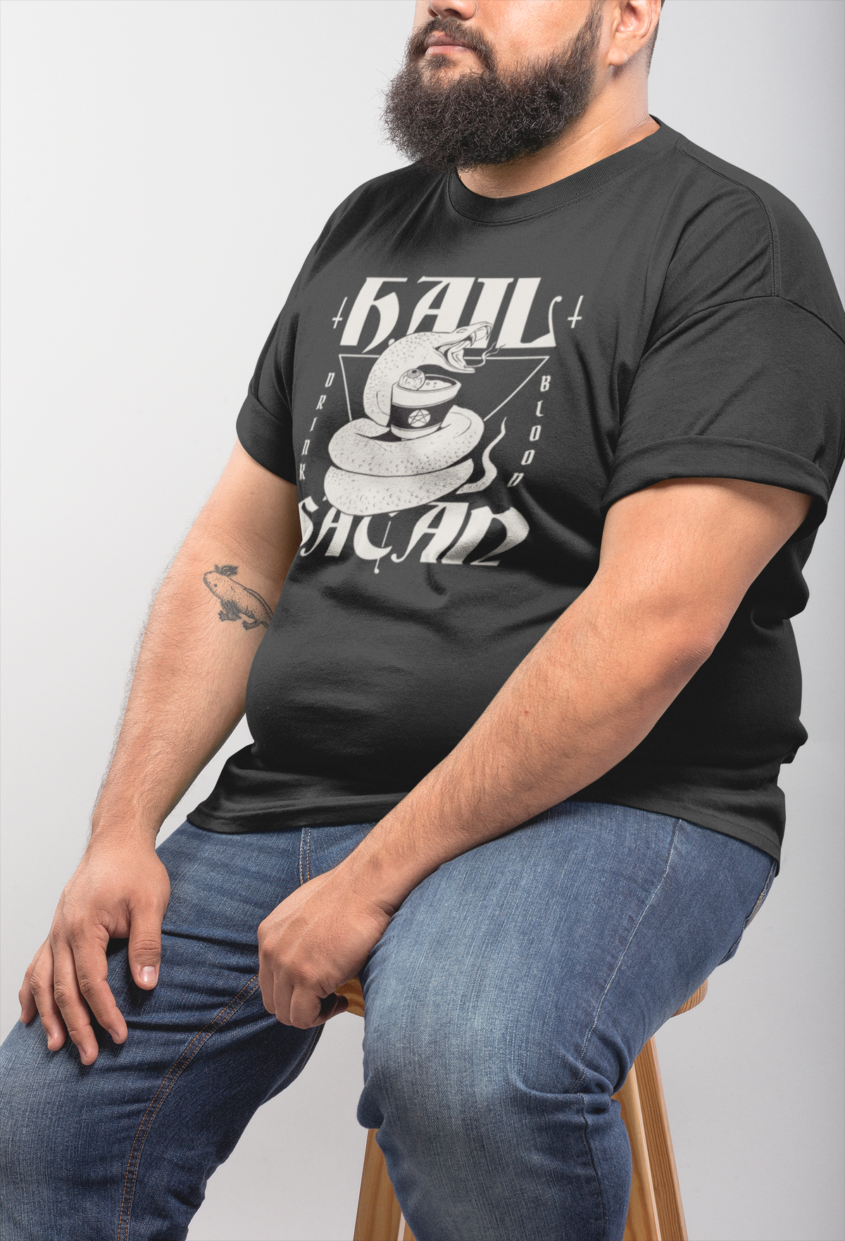 'Hail Satan' snake t-shirt in black, bearded man sitting wearing it, edgy gothic gift shirt