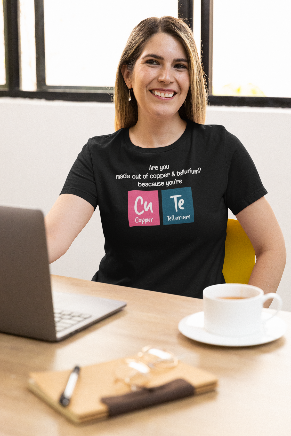 'Cu-Te' women's t-shirt in black, woman wearing it at the office, T-Shirt mockup, Geekpsters