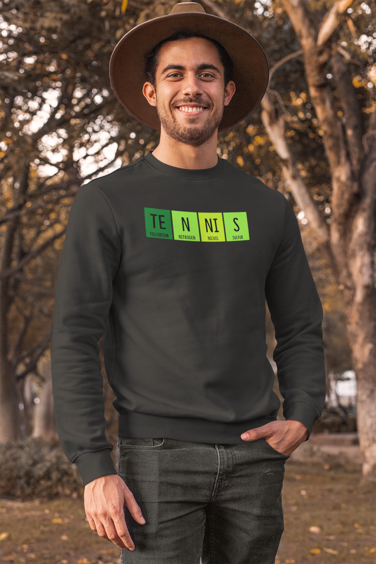 'Tennis' periodic table sweatshirt in black, bearded man wearing it outdoors, funny science tennis player gift