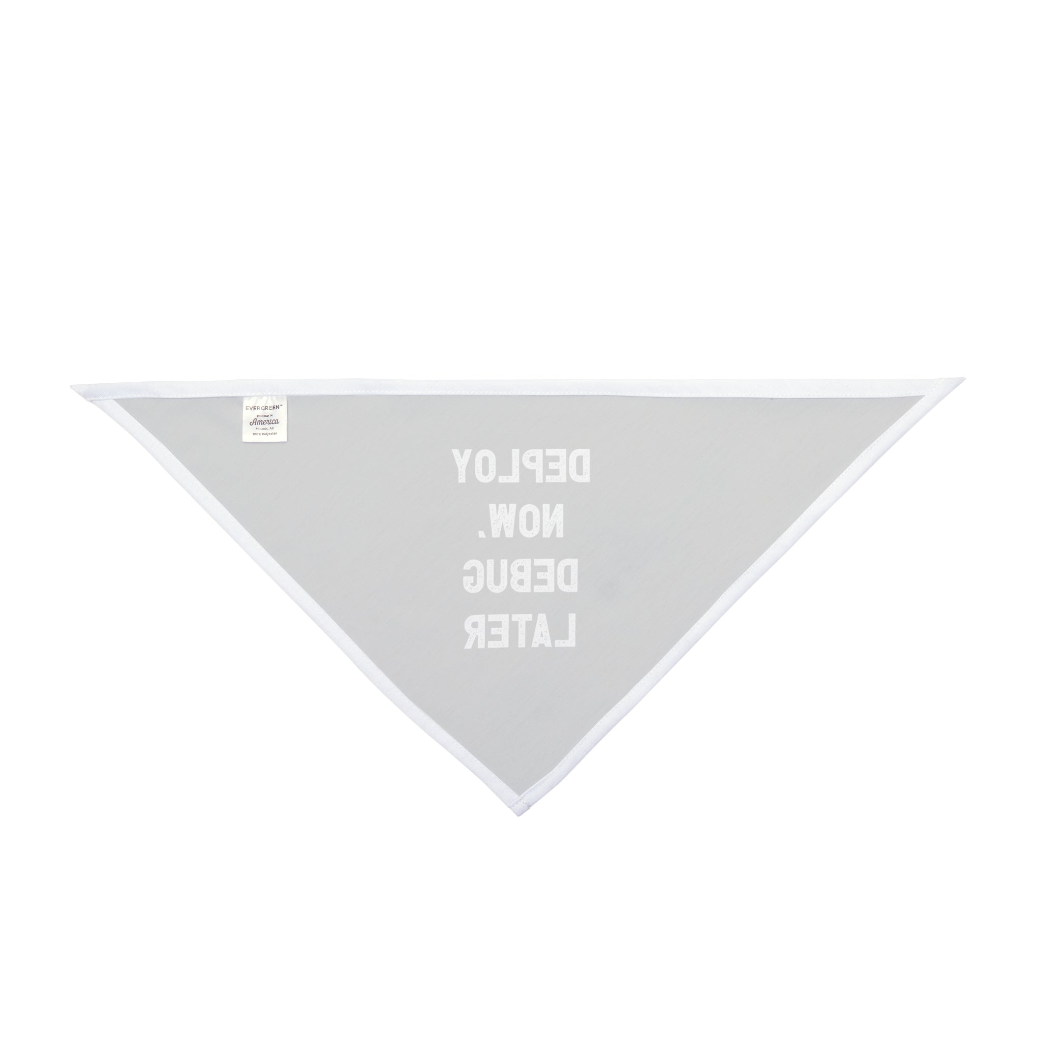 The Deploy Now, Debug Later - Pet Bandana is a stylish triangular accessory in gray, perfect for fashionable pets. It features the playful motto "DEPLOY NOW. DEBUG LATER." in white reverse text and is crafted from soft-spun polyester, ensuring comfort during your pet's adventures.