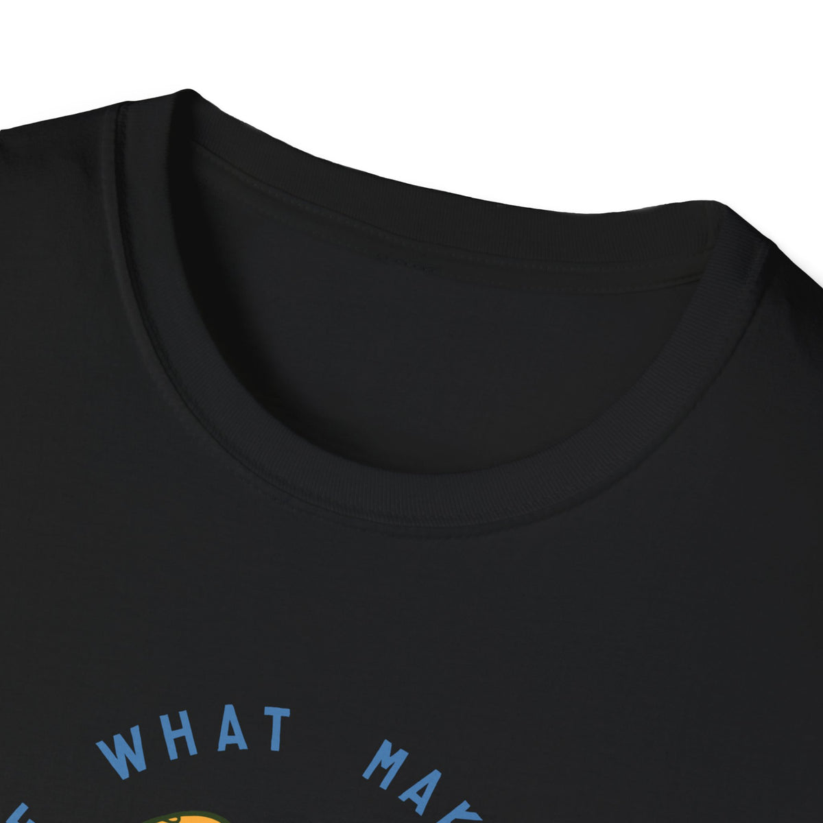 Close-up of "Do More of What Makes You Happy" text on black t-shirt hem, funny skater graphic detail