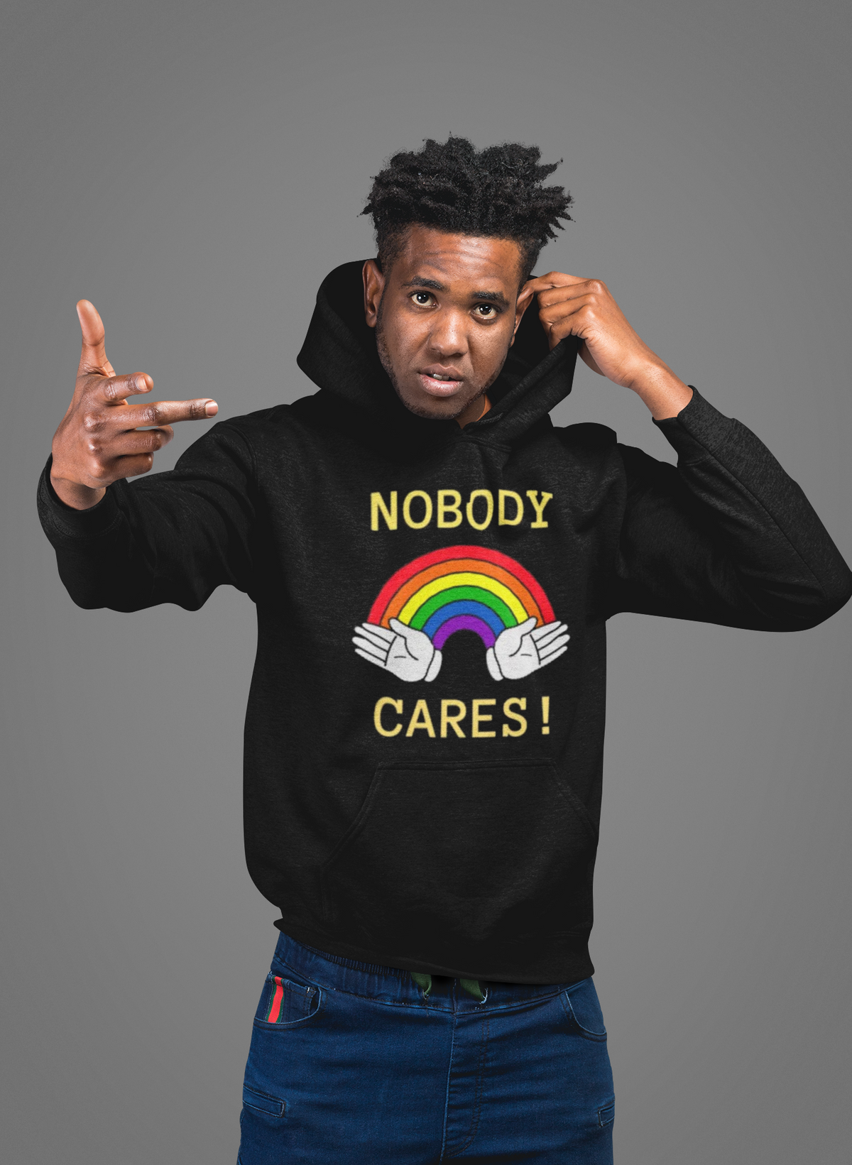 'Nobody Cares' hoodie in black, man wearing it in a studio, Hoodie mockup, Geekpsters