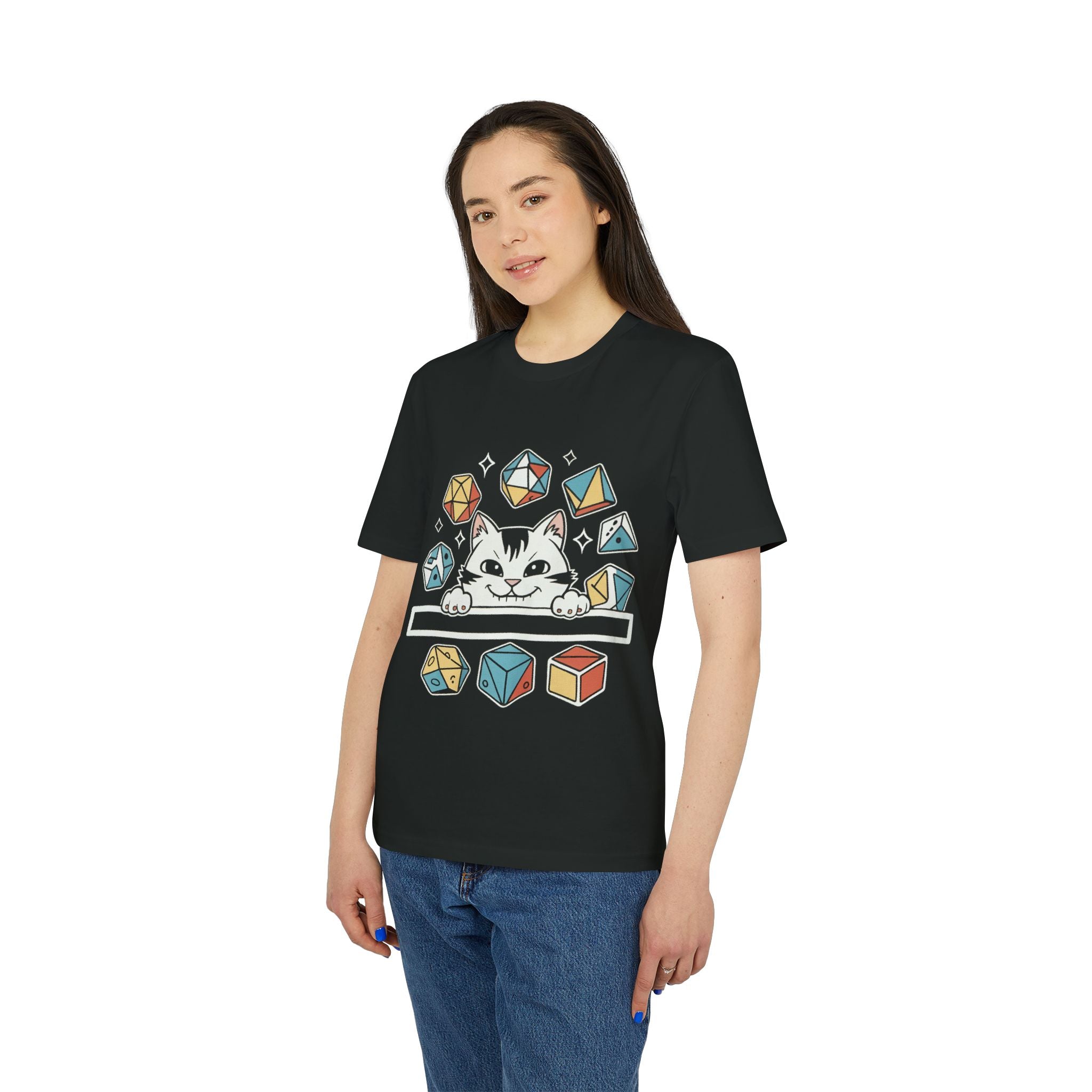 Woman modeling the Cat Dice - Organic T-Shirt, made from sustainable cotton, featuring a cat graphic surrounded by colorful geometric dice shapes, against a plain background.
