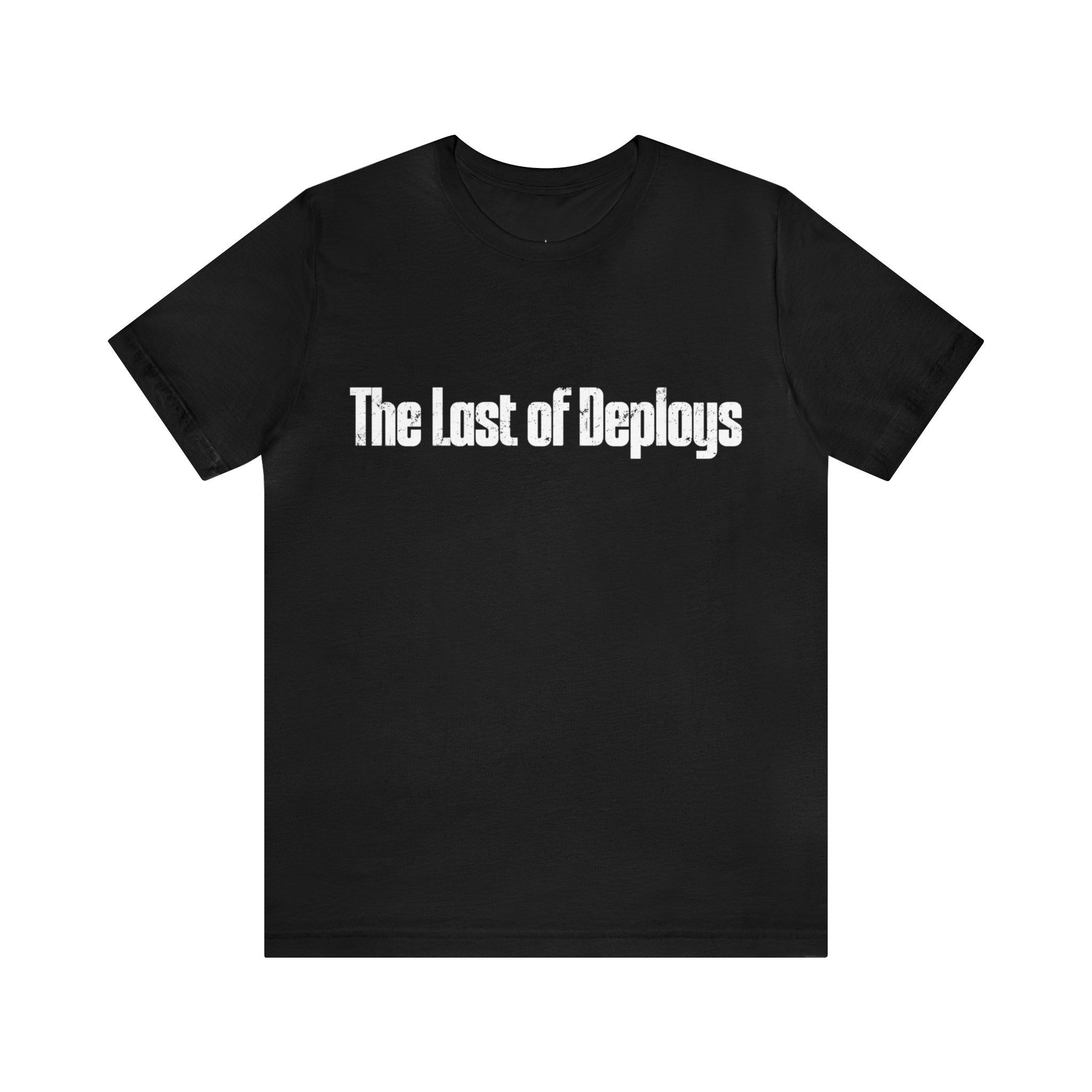 A soft cotton black T-shirt called "The Last of Deploys Tee Shirt," featuring a bold and stylish white print on the front.
